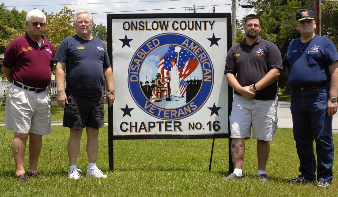 MARINE CORPS BASE CAMP LEJEUNE, N.C. ? From left to right,  Peter Franco, Paul Hetman, Jason Keough, Charles Montfort, all are disabled veterans who work for the Disabled American Veterans.