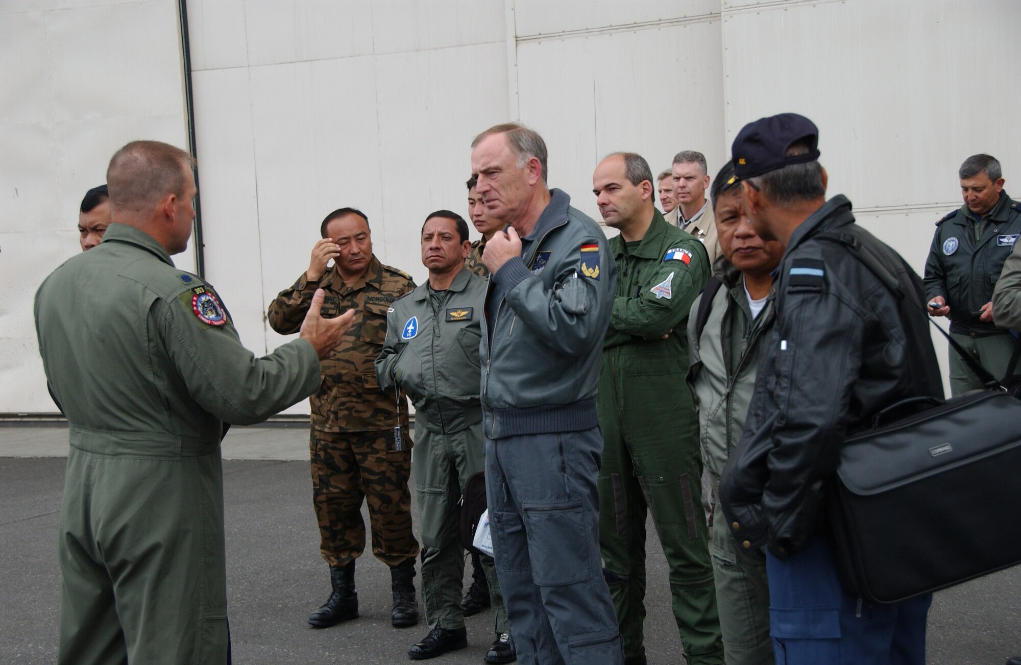 EIELSON AIR FORCE BASE, Alaska -- More than a dozen international officers visit here as part of the Executive Observer Program to observe Red Flag 07-3 operations July 23.  The exercise is focused on improving the combat readiness of U.S. and coalition forces and providing training for units preparing for air expeditionary force taskings. International partners will include Japan, Mongolia, Spain, Thailand, Turkey and NATO. (U.S. Air Force Photo by Airman 1st Class Christopher Griffin) 