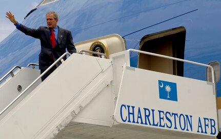 President George Bush waves to the crowd from Air Force One on the Charleston Air Force Base, flightline today. President Bush visited Charleston AFB, took a tour of a static C-17, ate lunch with Airmen from the base and talked about the Global War on Terrorism.  (U.S. Air Force Photo/Airman 1st Class Nicholas Pilch)
