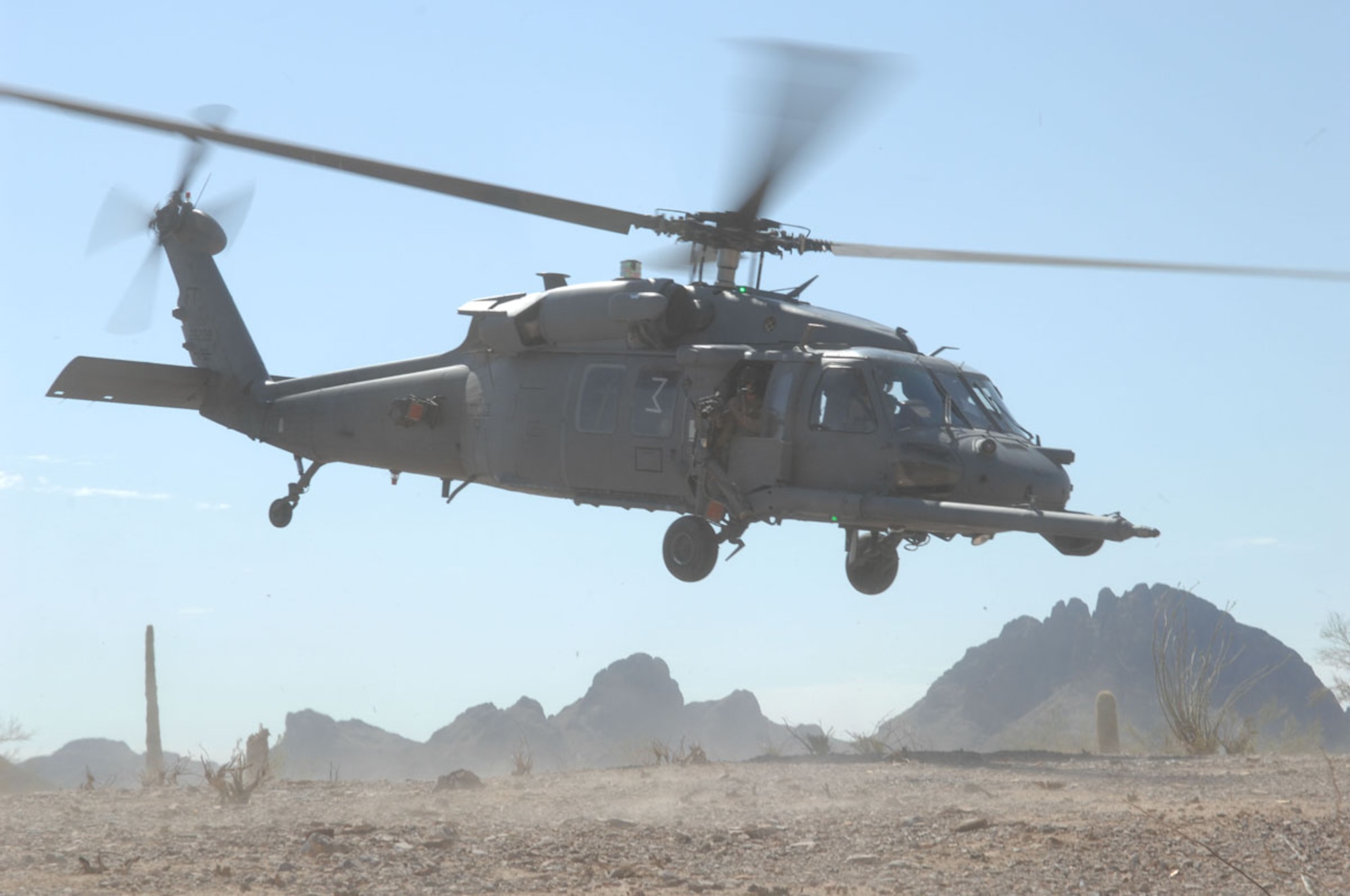 55th Rescue Squadron HH-60 helicopters provide transportation for 48th RQS pararescueman during exercise Angel Thunder in Gila Bend,AZ.Senior. Angel Thunder is a combat search and rescue task force exercise designed to test theater spin-up capabilities and examine the integration of all Air Force assets in mission planning procedures and mission execution. (U.S. Air Force photo/Staff Sgt Lanie McNeal)