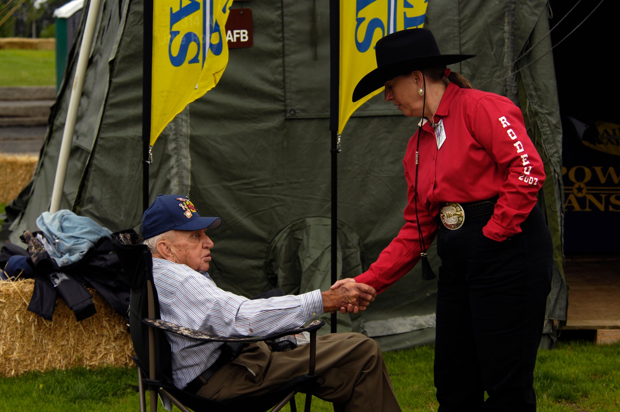 U.S. Air Force retired Brig. Gen. Oilver Myers from Little Rock, Ark., greets participants of Air Mobility Rodeo 2007 at McChord Air Force Base, Wash., July 22.  Air Mobility Command's Rodeo 2007 is a readiness competition of U.S. and international mobility air forces.  It focuses on improving warfighting capabilities and support of the Global War on Terrorism.  (U.S. Air Force photo/Tech. Sgt. Kevin P. Milliken) 

