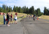 CLEAR LAKE, Wash. – A group of bikers round a bend during the Clear Lake Triathlon here July 21. The annual competition included a 600-yard swim, 15.34-mile bike and five-kilometer run. Sixty athletes completed in this year’s event, the third of its kind. (U.S. Air Force photo/ Staff Sgt. Connie L. Bias)