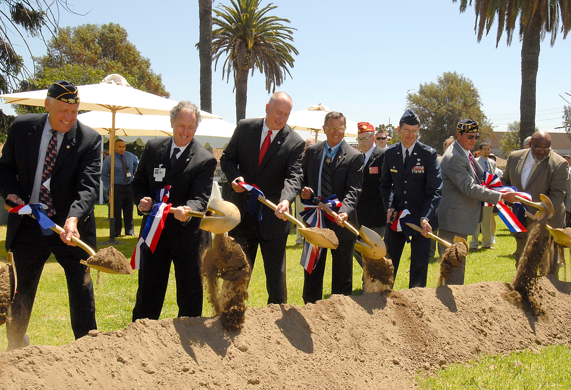 Col. Joseph Schwarz, 61st Air Base Wing commander, participated in the groundbreaking for a new Fisher House on the grounds of the VA's West Los Angeles campus.  The Pacific Palisades American Legion Post 283 donated $2 million to project that broke ground July 1.  In times of need, the Fisher House provides the opportunity for family members to be close to a loved one at the most stressful times -hospitalization for an illness, disease or injury.  (Photo by Joe Juarez)