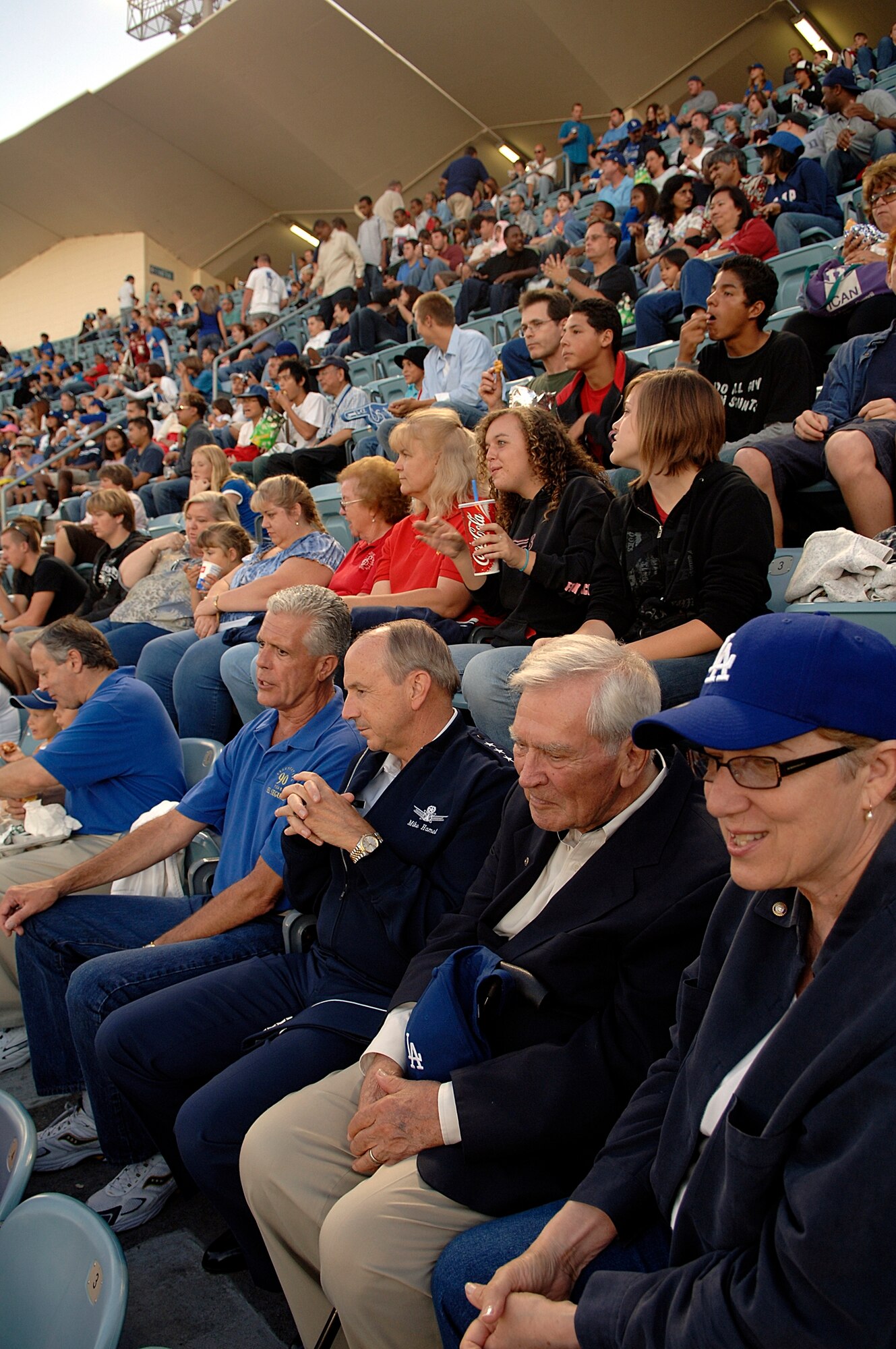 SMC Commander Lt. Gen. Michael Hamel chats with El Segundo Mayor Kelly McDowell at the Los Angeles Dodger game, July 20. The general threw out the first pitch at the game. (Photo by Paul Testerman)