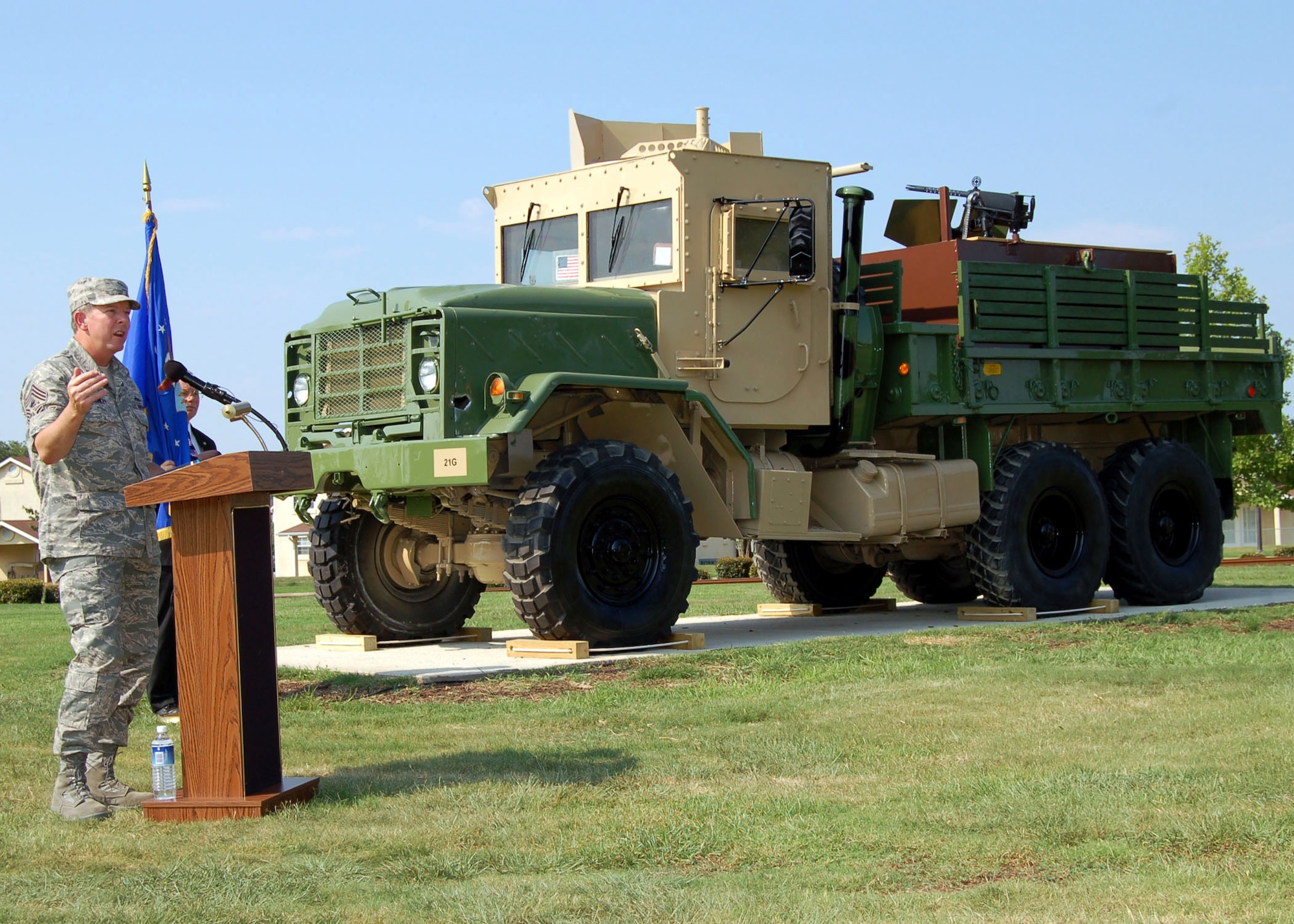 Chief Master Sgt. of the Air Force Rodney J. McKinley speaks during a ceremony July 23 to dedicate an Air Force convoy gun truck that was decommissioned after an Improvised Explosive Device (IED) attack in Iraq that made the vehicle inoperable.  The chief and 300 other senior enlisted leaders at the Senior Enlisted Leader Summit attended the event.  (U.S. Air Force photo/Master Sgt. Lee Roberts) 