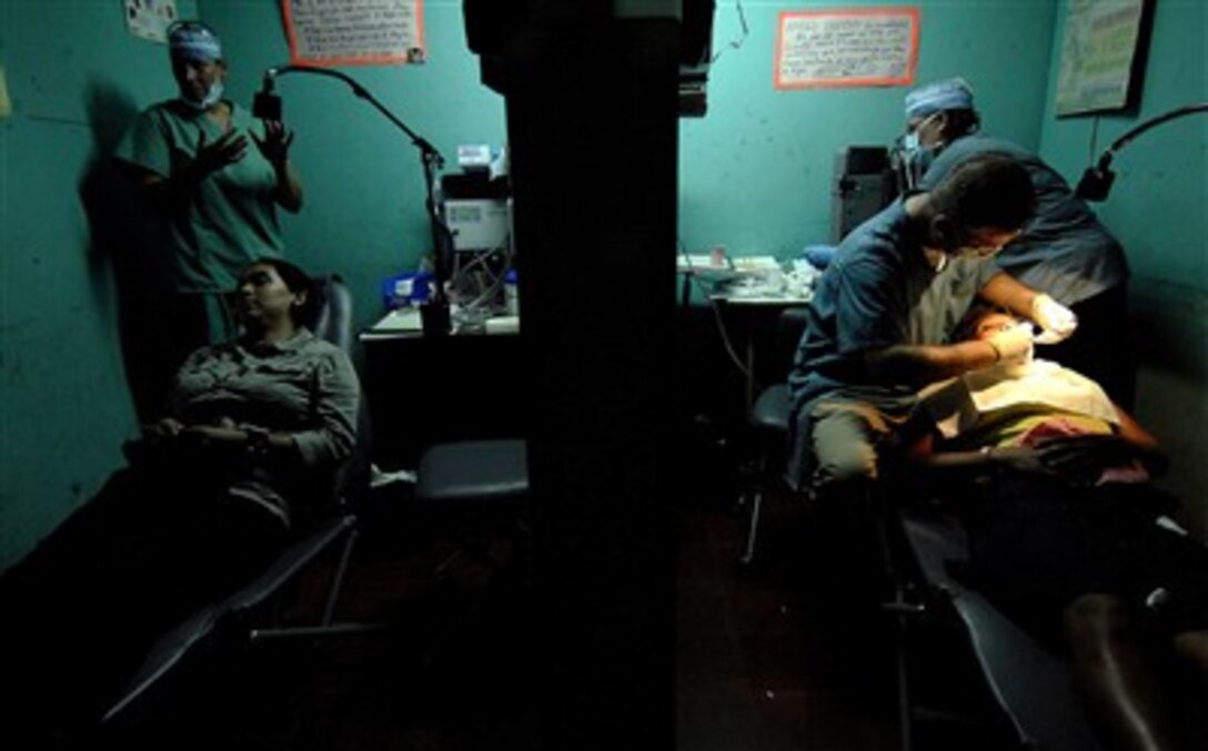 Capt. Joseph Rusz, a dental officer, examines a patient’s teeth at the Jose Schendal Health Center in Corinto, Nicaragua, July 19, 2007. Rusz is assigned to Military Sealift Command hospital ship USNS Comfort which is on a four-month humanitarian deployment to Latin America and the Caribbean.