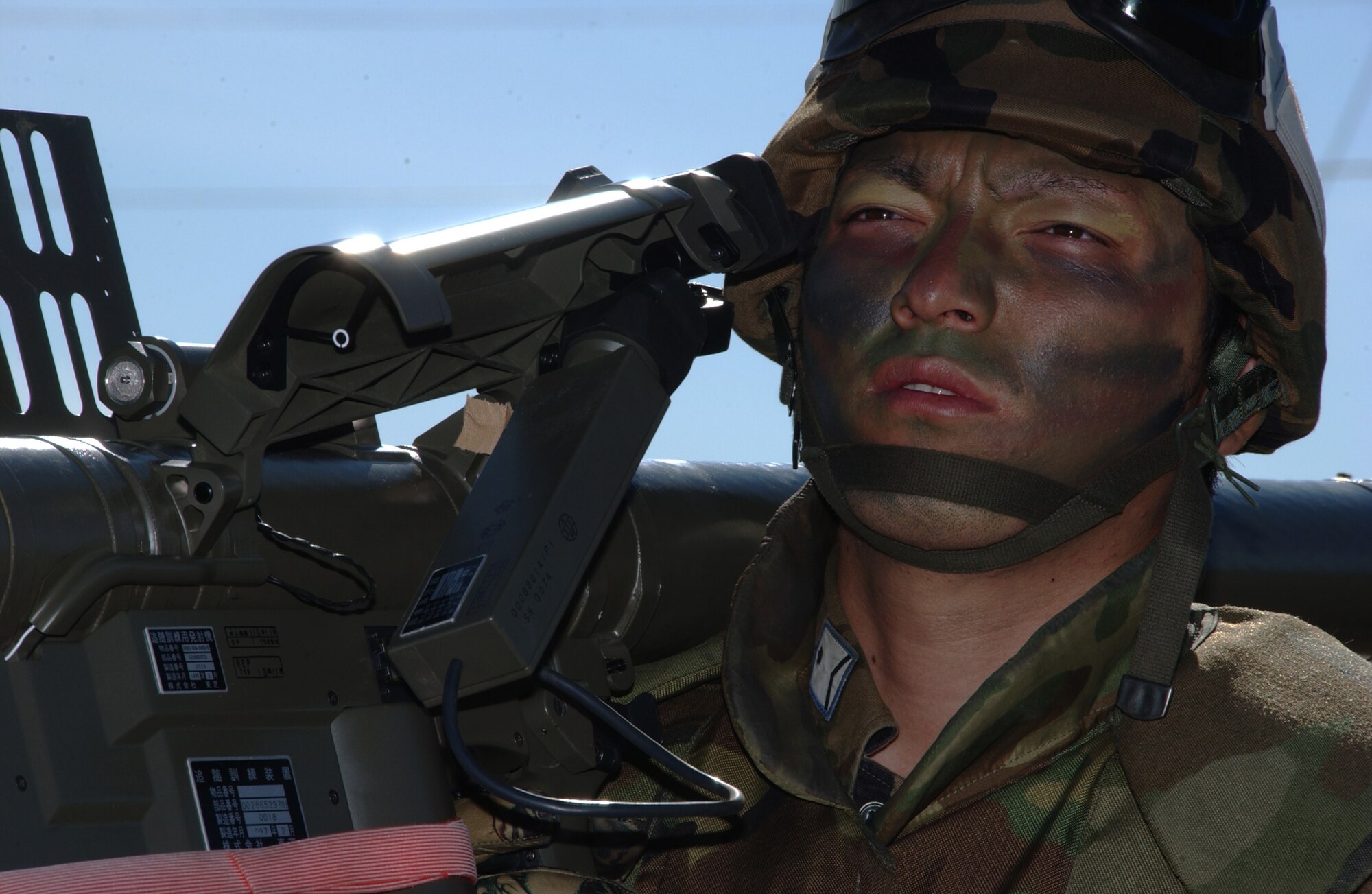EIELSON AIR FORCE BASE, Alaska -- Staff Sgt. Kenichira Watanabe, missile operator, Japanese Air Self Defense Force, uses a Type 91 Sam-2 Surface to Air missile launcher to take out enemy aircraft on the Pacific Alaskan Range Complex on July 24 during Red Flag-Alaska 07-3. With 67,000 square miles of rugged terrain, Japanese Forces are able to train tracking low flying aircrafts against a mountain back drop; this type of training is unavailable to them at their home station. (U.S. Air Force Photo by Airman 1st Class Jonathan Snyder)