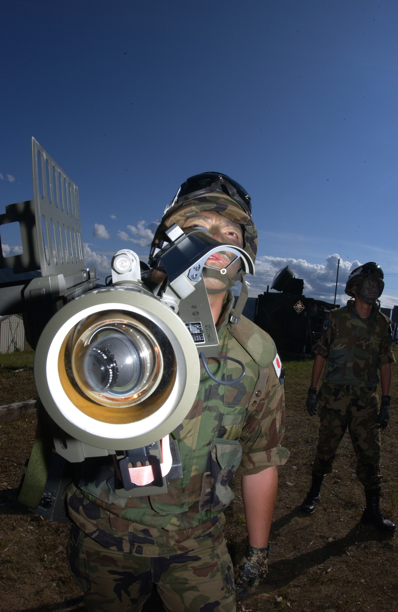 EIELSON AIR FORCE BASE, Alaska -- Staff Sgt. Kenichira Watanabe, missile operator, Japanese Air Self Defense Force, uses a Type 91 Sam-2 Surface to Air missile launcher to take out enemy aircraft on the Pacific Alaskan Range Complex on July 24 during Red Flag-Alaska 07-3. With 67,000 square miles of rugged terrain, Japanese Forces are able to train tracking low flying aircrafts against a mountain back drop; this type of training is unavailable to them at their home station. (U.S. Air Force Photo by Airman 1st Class Jonathan Snyder)