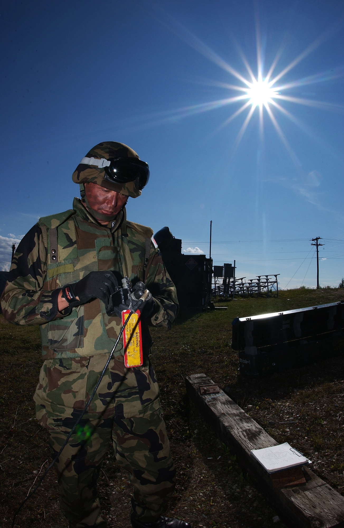 EIELSON AIR FORCE BASE, Alaska -- Technical Sgt. Tetsuo Totan, missile operator, Japanese Air Self Defense Force, launches smokey sams at enemy aircraft on the Pacific Alaskan Range Complex on July 24 during Red Flag-Alaska 07-3. With 67,000 square miles of rugged terrain, Japanese Forces are able to train tracking low flying aircrafts against a mountain back drop; this type of training is unavailable to them at their home station. (U.S. Air Force Photo by Airman 1st Class Jonathan Snyder)