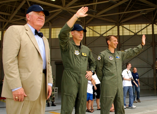 Honorary commander Bill Moody, Col. John "Red" Millander and 437th Airlift Wing commander, Col. Mark Bauknight, 315th Airlift Wing acting commander wave to the 2007  AMC Rodeo Team aboard a C-17 before takeoff to McCord AFB, Wash. (U.S. Air Force photo/Airman 1st Class Nicholas Pilch) 