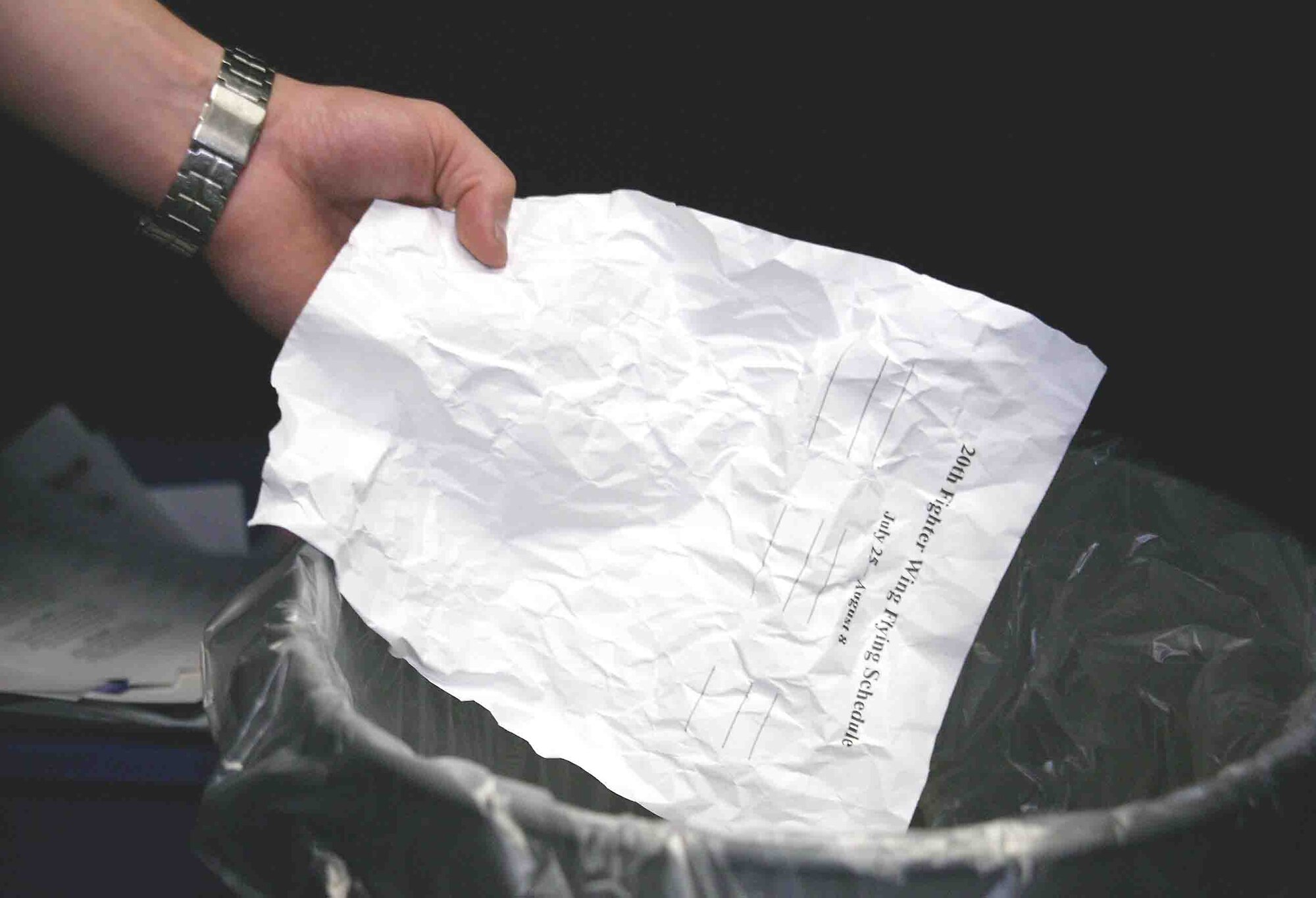 Practicing good operations security by shredding paperwork when no longer needed ensures control of critical information. Throwing away sensitive information could result in it ending up in the wrong hands. (U.S. Air Force photo illustration/Senior Airman John Gordinier)