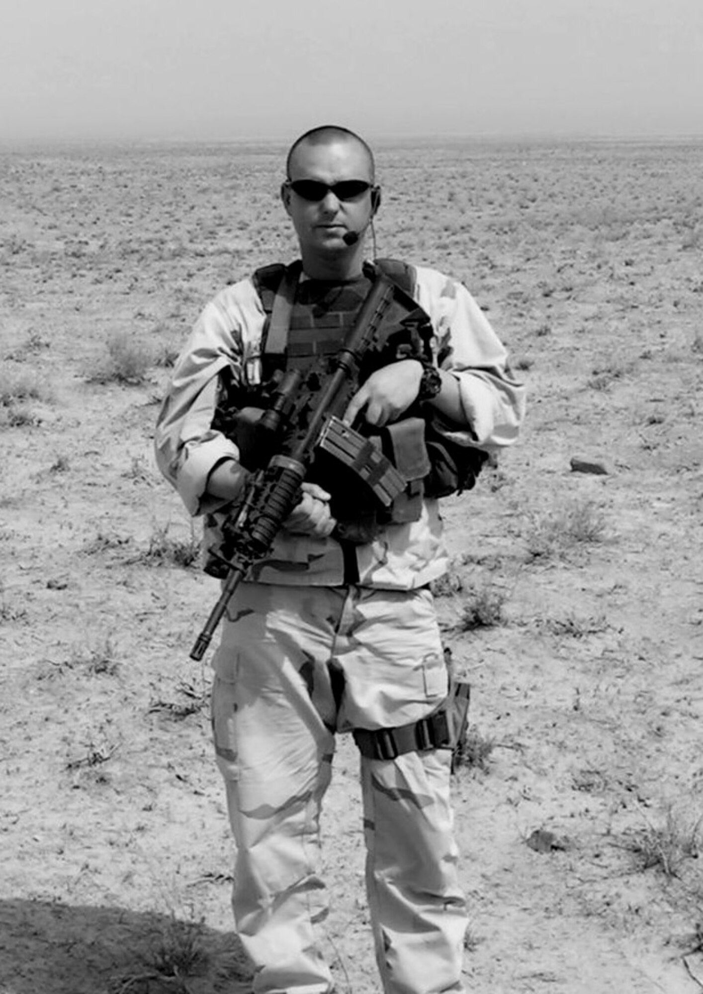 Only 20 minutes prior to the firefight Aug. 8, 2006 in Qalat Province, Afghanistan, Staff Sgt. Jason Kimberling had this photo taken of himself by a fellow Airman. Sergeant Kimberling was awarded a Bronze Star with valor and an Army Commendation Medal at Mountain Home Air Force Base, Idaho, July 19 for his actions in Afghanistan. Sergeant Kimberling was one of only three Americans in a coalition tasking with the Afghan national police and Army that was attacked. His actions prevented the entire coalition force from being split up during an ambush. Sergeant Kimberling is assigned to the 366th Security Forces Squadron at Mountain Home AFB. (Courtesy photo) 
