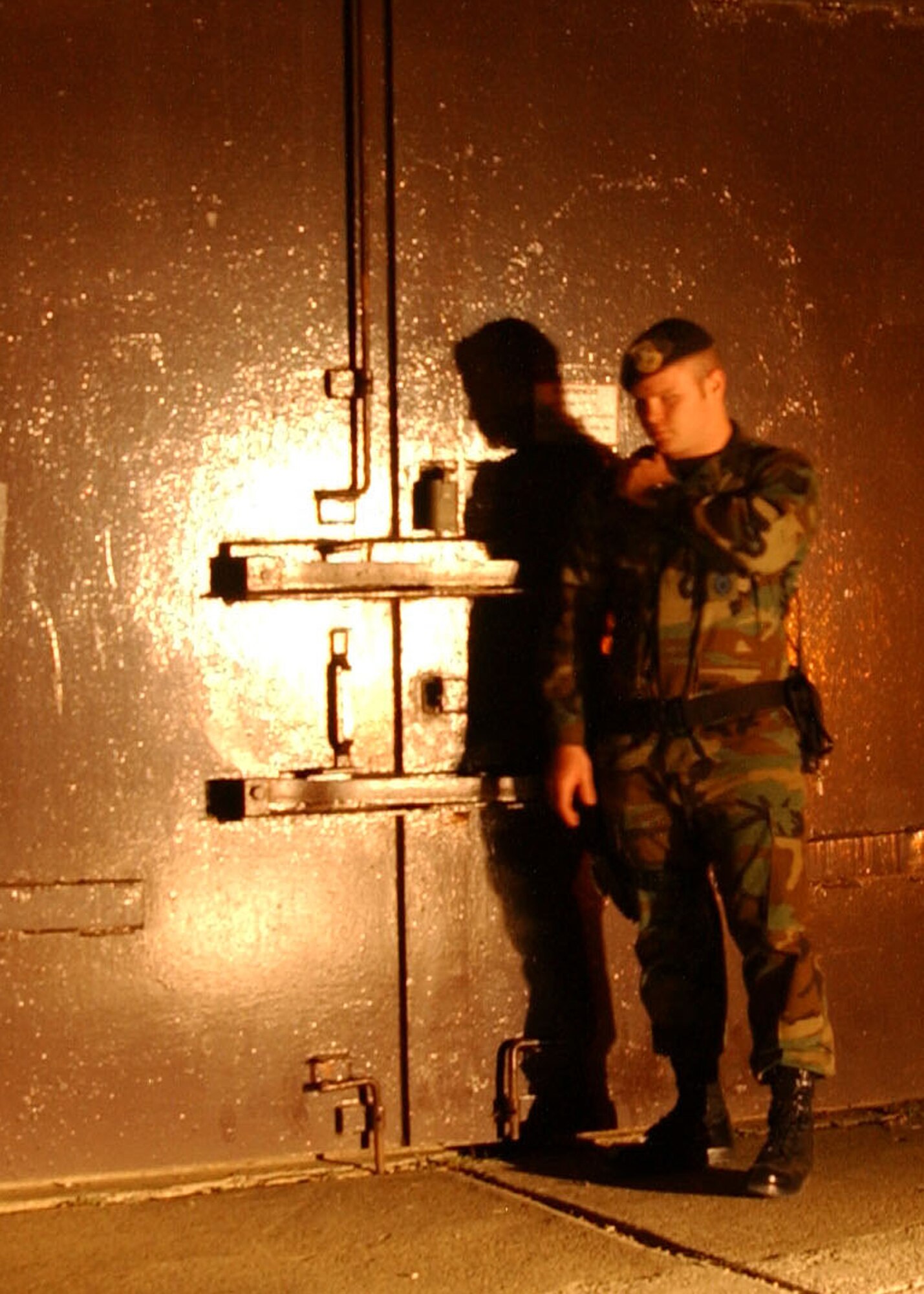 Staff Sgt. William Spahr, 39th Security Forces Squadron, checks the security of a building during an alarm activation response. By enforcing base laws and conducting security checks the 39th SFS ensure the safety of Team Incirlik. (U. S. Air Force photo by Tech. Sgt. Patrick Hyde)