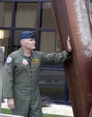 601st Air and Space Operations Center Commander, Col. David Kriner, at the 9-11 memorial located in front of the new Air and Space Operations Center. "America's AOC" monitors all of the air traffic for the Continental United States.                                