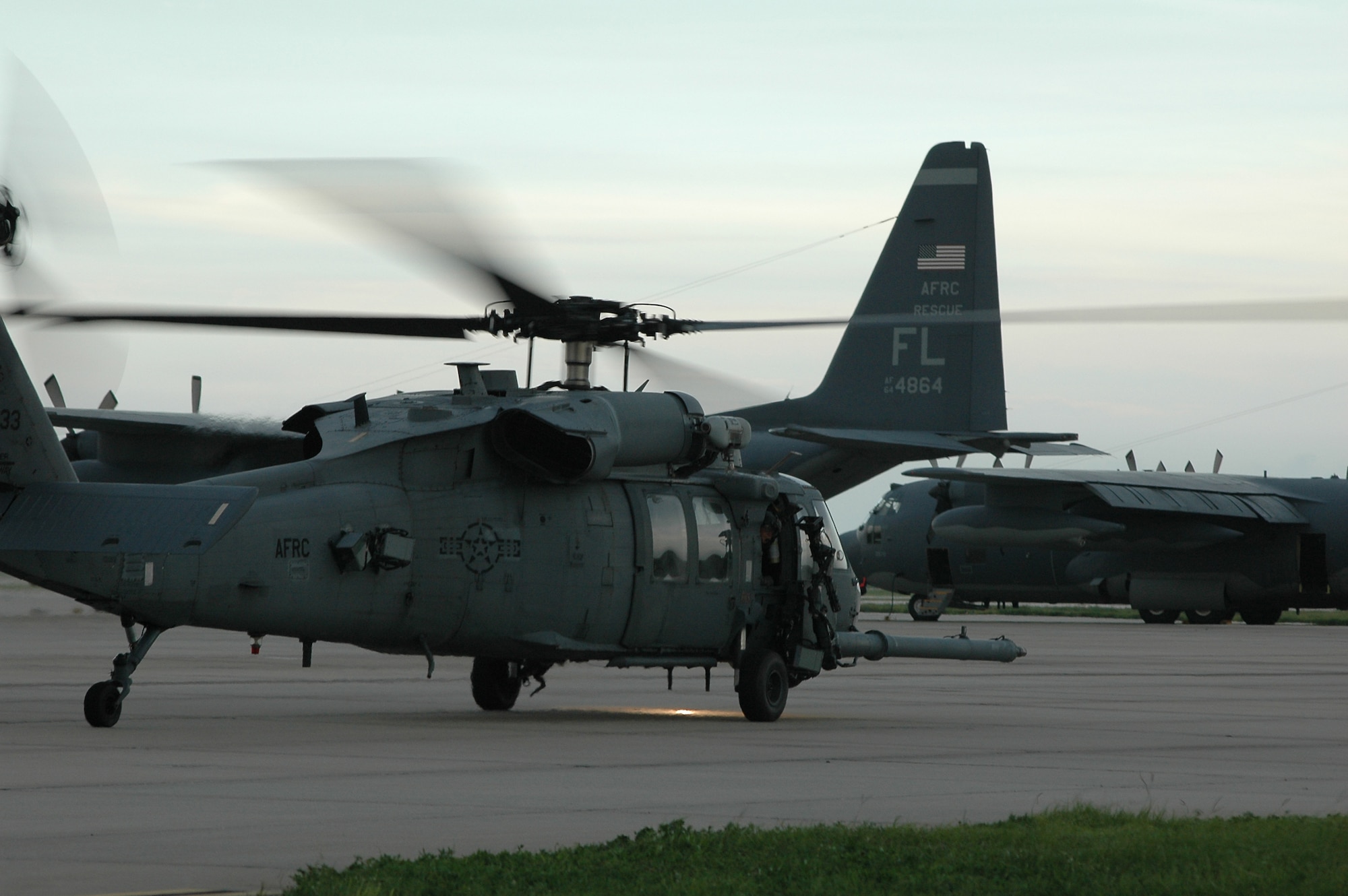 Air Force Reserve rescue helicopter crews from 920th Rescue Wing take time to refuel briefly at Patrick Air Force Base before heading back out to the Atlantic Ocean off the coast of Cape Canaveral, Fla. to continue their search efforts for a missing diver.