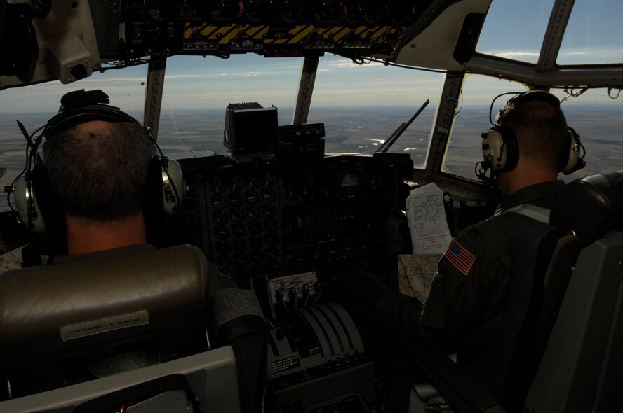 U.S. Air Force Lt. Col. Rich Elder and 1st Lt. Joe Bennington, C-130 pilots from the 910th Airlift Wing, Youngstown Air Reserve Station, OH., fly a mission from McChord Air Force Base, Wash., July 24, during Air Mobility Rodeo 2007. Air Mobility Command's Rodeo 2007 is a readiness competition of U.S. and international mobility air forces.  It focuses on improving war fighting capabilities and support of the Global War on Terrorism. (U.S. Air Force photo/Senior Airman Patrick J Dixon) 

