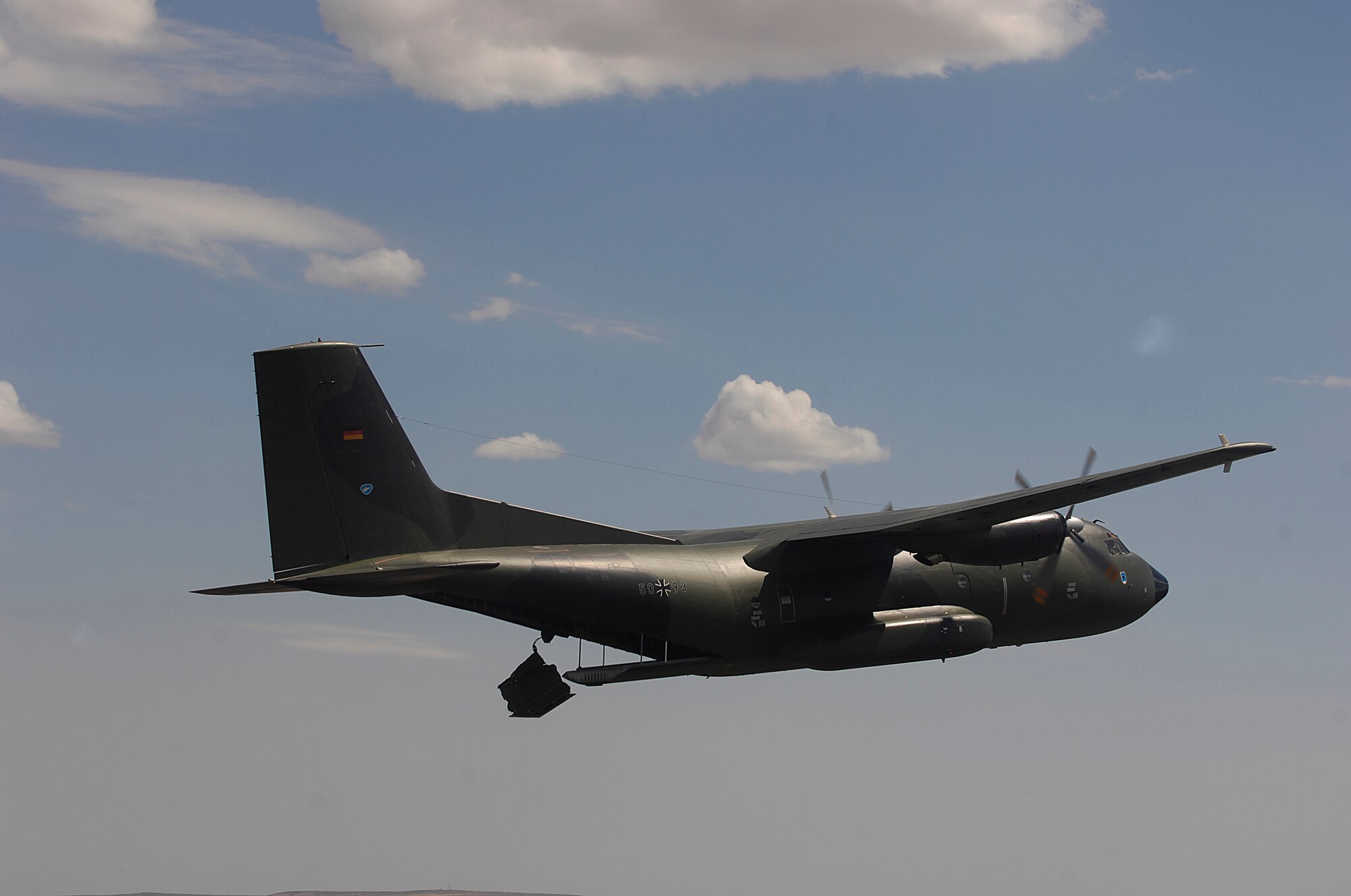 A German Air Force C-160 competes in the air drop competition for Air Mobility Rodeo 2007 by dropping pallets on targets July 23 near Moses Lake, Wash.  Air Mobility Command's Rodeo 2007 is a readiness competition of U.S. and international mobility air forces.  It focuses on improving warfighting capabilities and support of the Global War on Terrorism.  (U.S. Air Force Photo/Staff Sgt. Richard Rose) 

