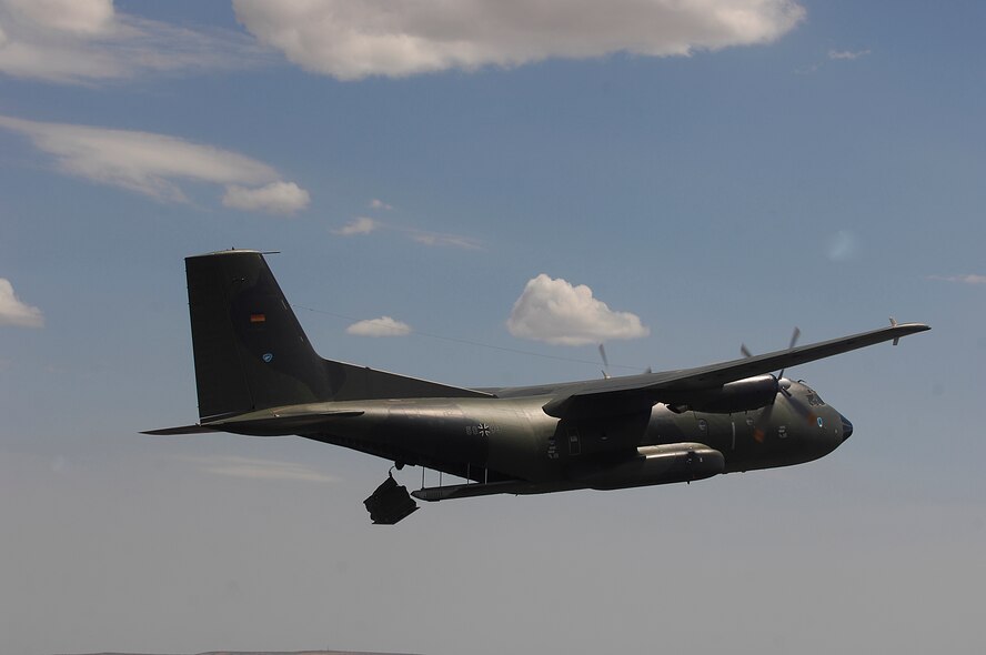 A German Air Force C-160 competes in the air drop competition for Air Mobility Rodeo 2007 by dropping pallets on targets July 23 near Moses Lake, Wash.  Air Mobility Command's Rodeo 2007 is a readiness competition of U.S. and international mobility air forces.  It focuses on improving warfighting capabilities and support of the Global War on Terrorism.  (U.S. Air Force Photo/Staff Sgt. Richard Rose) 


