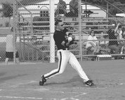 Brian Fisher, 59th Laboratory Squadron at Lackland Air Force Base, Texas, swings at a pitch in a game against the 37th Civil Engineer Squadron July 23. Lab defeated CES 11-10 in the second round of the Intramural Softball Base Championship. (USAF photo by Alan Boedeker)