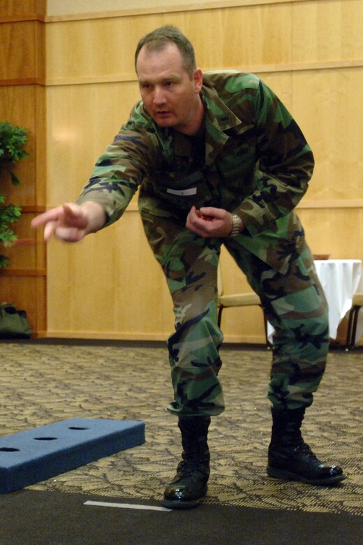 1st Lt. Eric Judd, 75th Mission Support Group executive officer, participates in the 75th Air Base Wing washer tournament. The 75th Dental Squadron took first place, the 75 ABW placed second, and the 75th Medical Group received the Rusty Washer award.