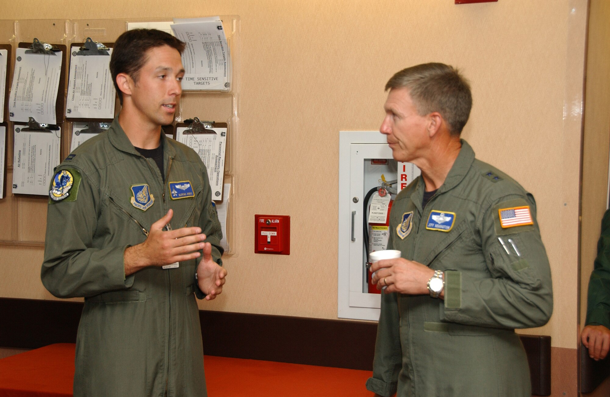 EIELSON AIR FORCE BASE, Alaska -- Capt. Juskys Aleksas, 18th Fighter Squadron, explains to Maj. Gen. Jeffrey Remington the positive impacts Red Flag-Alaska has had on his experience in training July 25, 2007. Major Gen. Remington is the Director of Air, Space, and Information Operations for PACAF he is visiting Red Flag to access the importance of the exercise in the joint environment with other nations. (U.S. Air Force photo by Airman 1st Class Christopher Griffin)