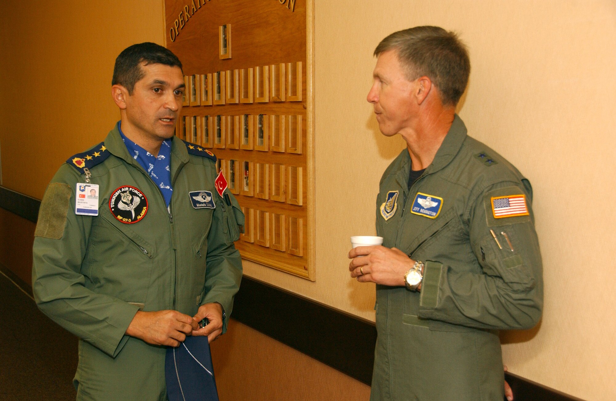 EIELSON AIR FORCE BASE, Alaska -- Colonel Ilhan Mustafa, Turkish Air Force, speaks with Maj. Gen. Jeffrey Remington, during Red Flag-Alaska 07-3 July 25, 2007. Major Gen. Remington is the Director of Air, Space, and Information Operations for PACAF and is visiting Red Flag to access the importance of the exercise in the joint environment with other nations. (U.S. Air Force photo by Airman 1st Class Christopher Griffin)