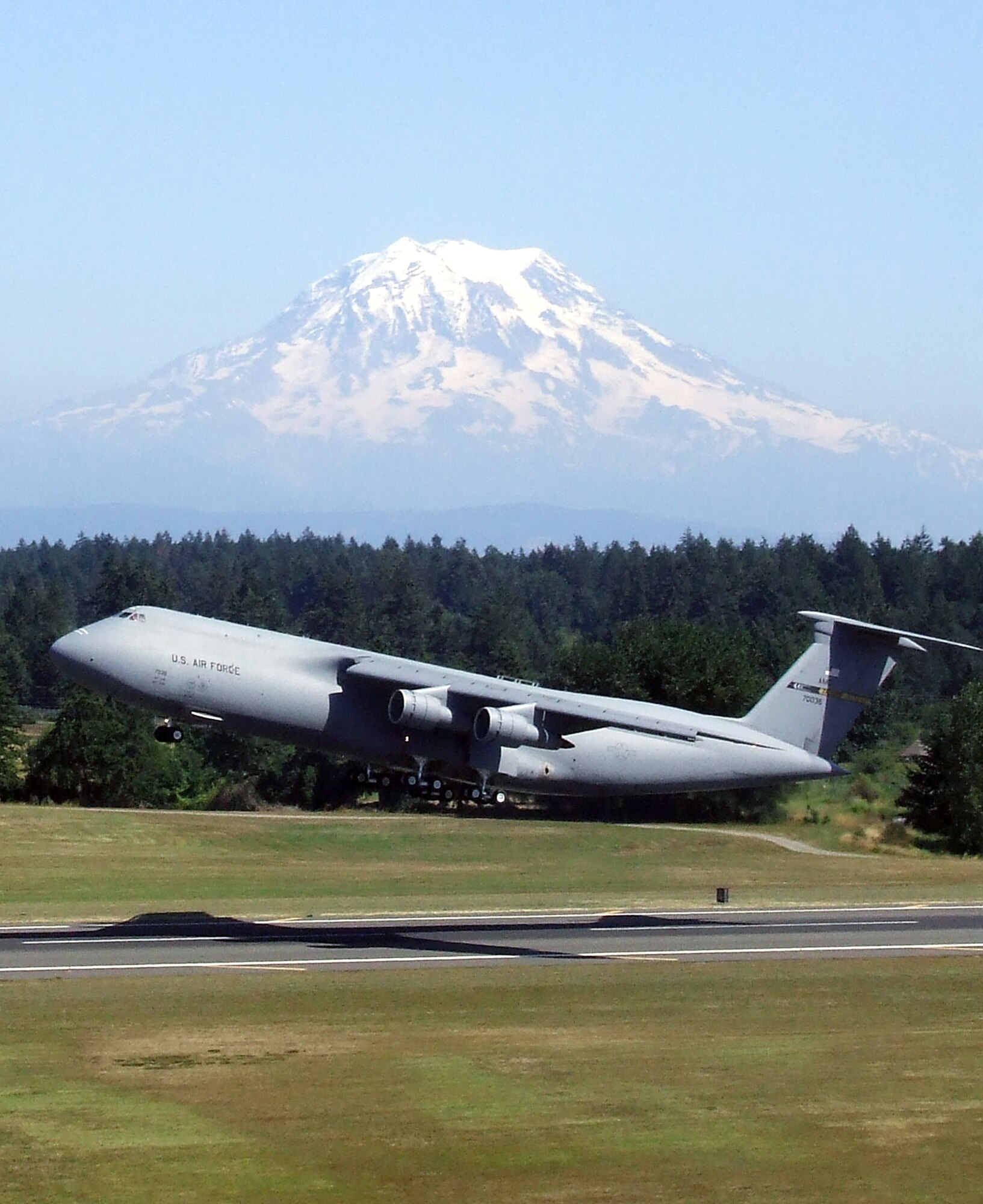 A C-5 Galaxy from Travis Air Force Base, Calif., takes off for a competition mission for Air Mobility Rodeo 2007 July 25, 2007.  Rodeo, sponsored by Air Mobility Command, is a readiness competition for U.S. and international mobility air forces.  Rodeo 2007 has the largest international team representation in its history and is overall the largest Rodeo competition ever completed.  (U.S. Air Force Photo/Tech. Sgt. Scott T. Sturkol)