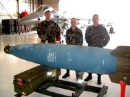 The 4th Aircraft Maintenance Unit won the 3rd quarter Load Crew of the Quarter competition held July 13 in Hangar 37. The crew, who include Staff Sgt. Gil Weisbaum, Senior Airman Daniel Larson and Senior Airman Hunter Pettit, were evaluated in five different categories and had 25 minutes to comlete the load. Winning crews receive a plaque, a one-day pass and a traveling trophy.