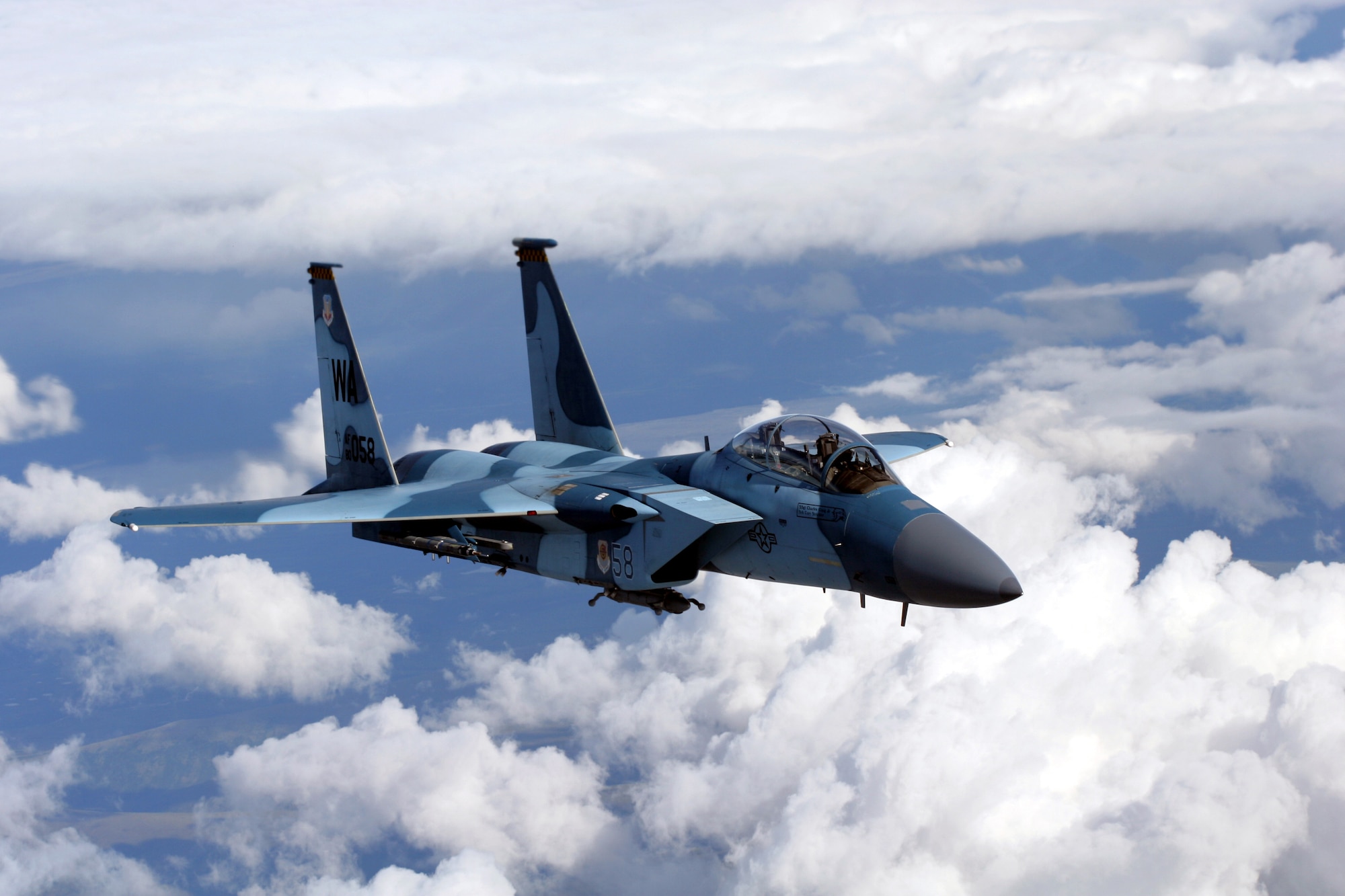 EIELSON AIR FORCE BASE, Alaska -- An F-15C Aggressor from 65th Aggressor Squadron, Nellis Air Force Base, Nev., during a refueling mission at Red Flag - Alaska July 25. Red Flag - Alaska enables aviation units to sharpen their combat skills by flying simulated combat sorties in a realistic threat environment. More than 80 aircraft and 1500 servicemembers from 6 different countries are participating in the exercise over the Last Frontier July 12-27.   (U.S. Air Force photo by Capt Tana Stevenson)