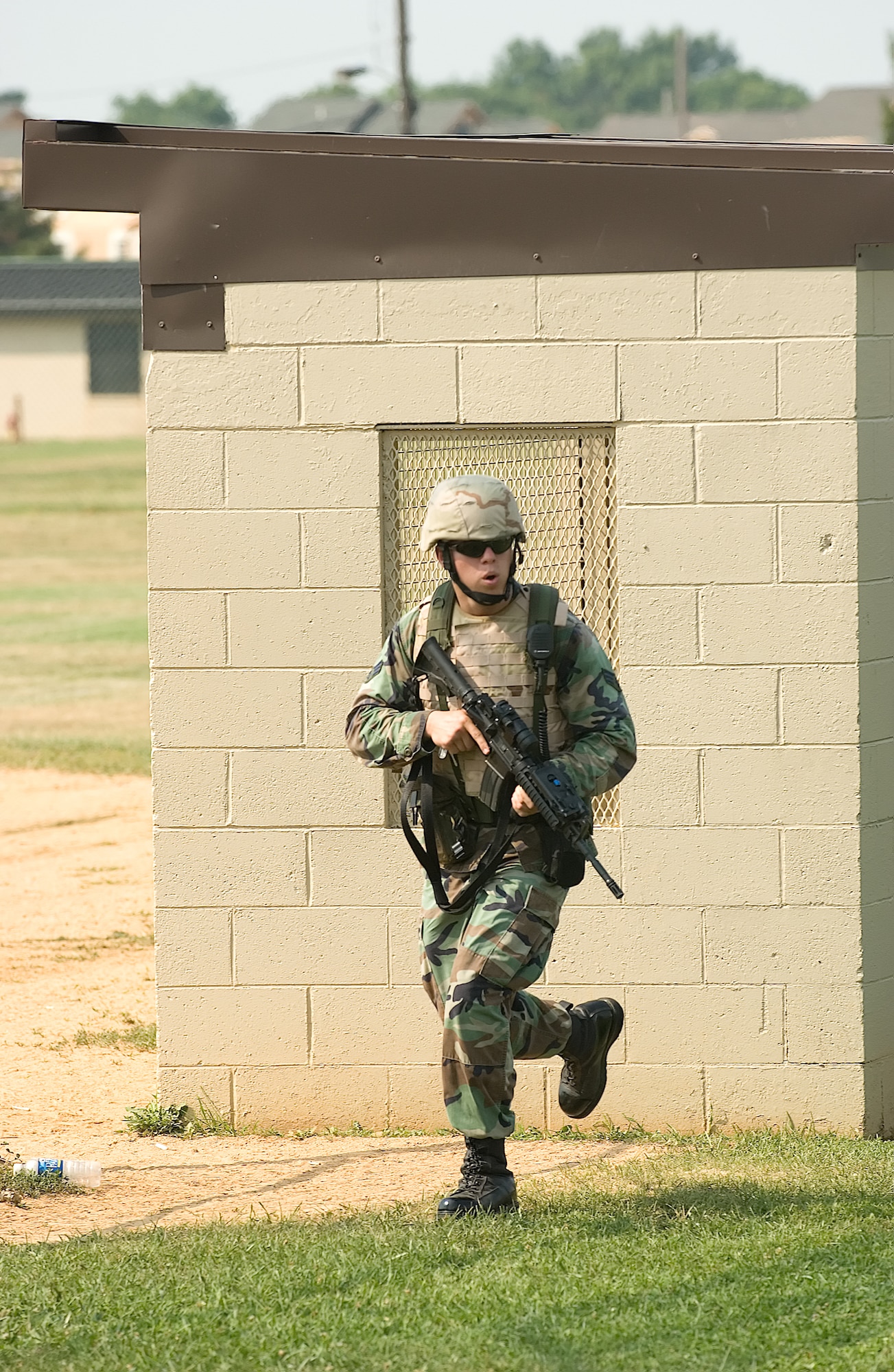 Senior Airman Keith Markus, 436th Security Forces Squadron member, responds to an exercise scenerio here July 19. (U.S. Air Force photo/Jason Minto)