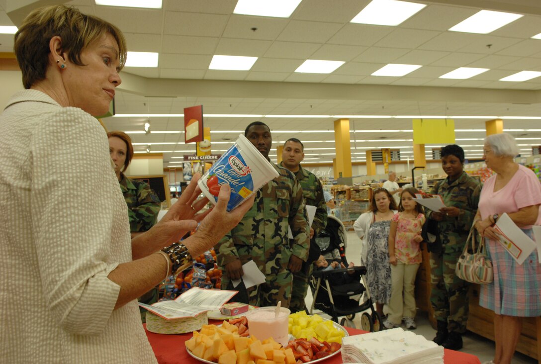 Sheila Bailey, Registered Dietitian, Health and Wellness Center in the Shellbank Fitness Center, is hosting Nutrition tours once a month at our Commissary to educate members on making healthy choices when selecting their groceries on July 24, 2007.   Bailey demonstrates correct food choices against incorrect choices, while explaining the facts of these foods in relationship to your body and daily health.  (U.S. Air Force photo/Senior Airman Tabitha Kuykendall)