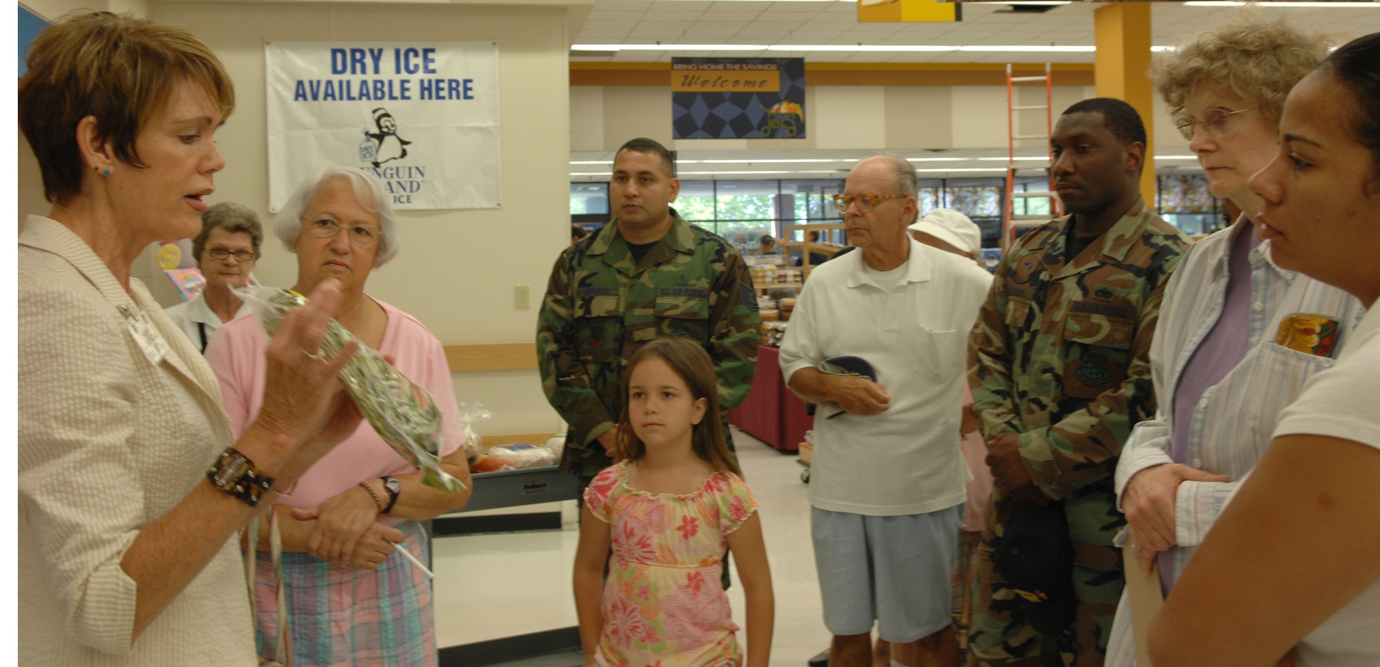 Sheila Bailey, Langley Health and Wellness Center registered dietitian, hosts a nutrition tour at the commissary July 24. The tours are held on a monthly basis to educate people on making healthy food choices. For more information on nutrition tours, call the HAWC at 764-6321. (U.S. Air Force photo/Senior Airman Tabitha Kuykendall)