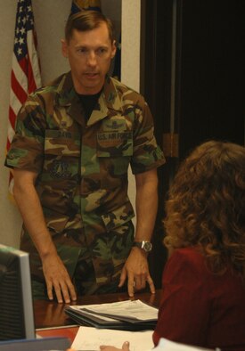 Col. Roderick Davis, 341st Mission Support Group commander, reviews his schedule with his seceretary Kelly Wolfe July 17. Colonel Davis took command of the 341st MSG July 2.  (U.S. Air Force photo / Airman 1st Class Dillon White)