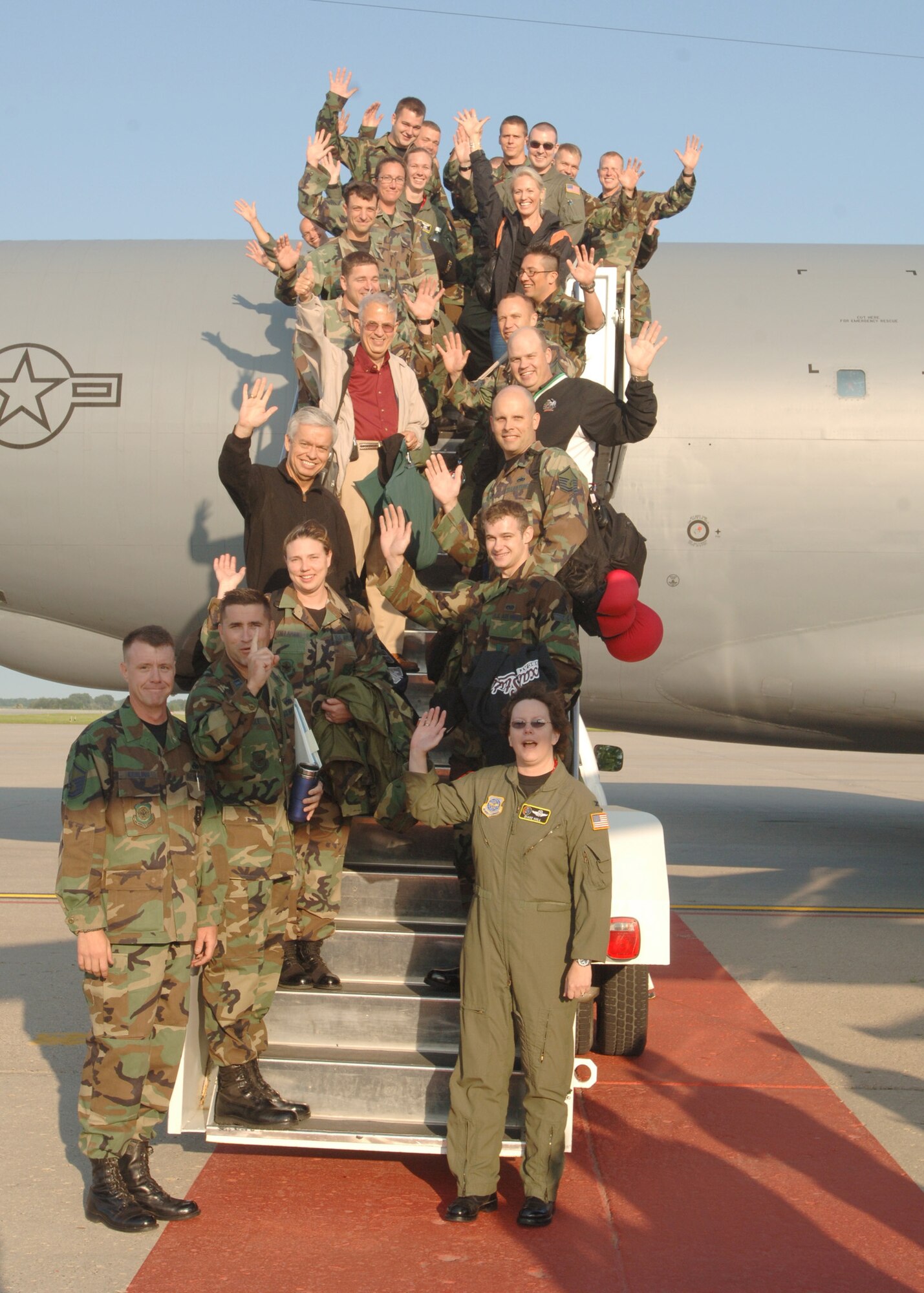 GRAND FORKS AIR FORCE BASE, N.D. --Team Grand Forks waves to the camera before departing to Air Mobility Command?s RODEO air mobility competition at McChord Air Force Base, Wash., where they will compete against more than 40 teams from across the Air Force and around the world.  
The team members and jet were hand-picked and represent the best aircrew, maintainers, aerial porters and security forces Airmen the base has to offer.
The first RODEO competition was held in 1956 at Bakalar AFB, Ind. (U.S. Air Force phot/Airman 1st Class Chad Kellum)