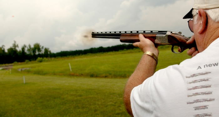 Navy veteran Al Clark fires at a clay pigeon during a skeet shooting game.  (U.S. Air Force photo/Airman 1st Class Nicholas Pilch) 
