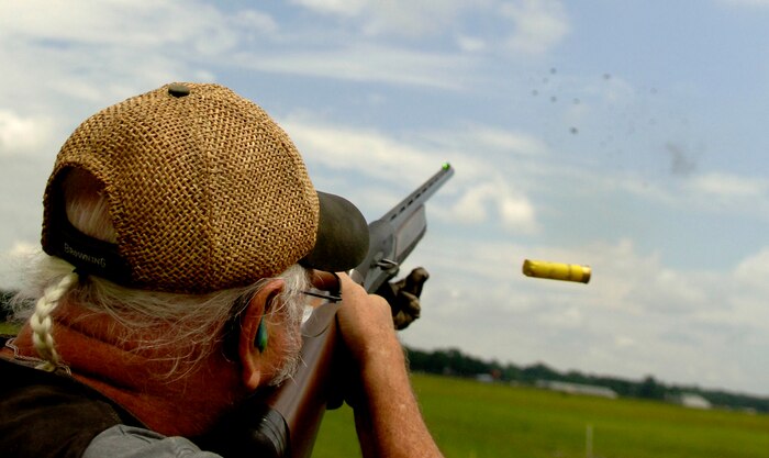 Retired NBC art director Jim Nicholson fires at a clay pigeon during a skeet shooting game at the Charleston AFB's Skeet and Trap Range Wednesday.  (U.S. Air Force photo/Airman 1st Class Nicholas Pilch) 