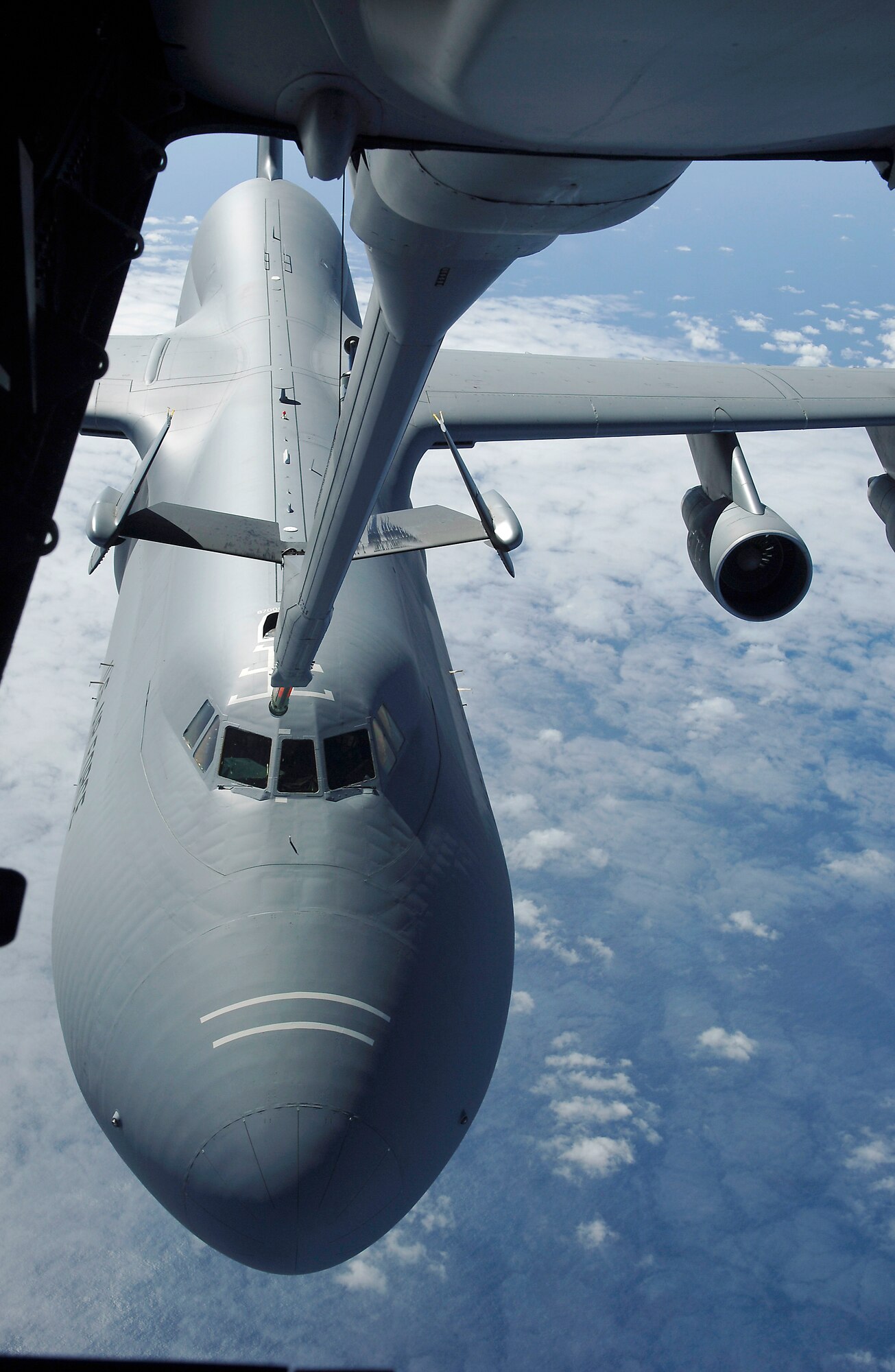 A KC-10 Extender flown by a blended crew from McGuire Air Force Base, N.J., prepares to refuel a C-5 Galaxy July 23 from the 436th Airlift Wing at Dover AFB, Del.  The blended crew comprises Airmen from both the active duty 305th Air Mobility Wing and the Air Force Reserve 514th AMW at McGuire AFB.  There are two blended teams competing at Air Mobility Rodeo 2007.  The other blended team is from Charleston AFB, S.C.  (U.S. Air Force photo by Master Sgt. Mike Buytas)