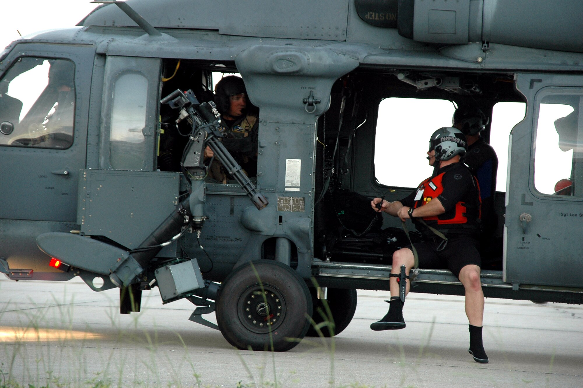 A helicopter rescue crew from the 920th Rescue Wing refuels at Patrick Air Force Base, Fla., before heading back out to the Atlantic Ocean off the coast of Cape Canaveral to continue their search efforts for a missing diver July 26. (U.S. Air Force photo/Capt. Cathleen Snow)
