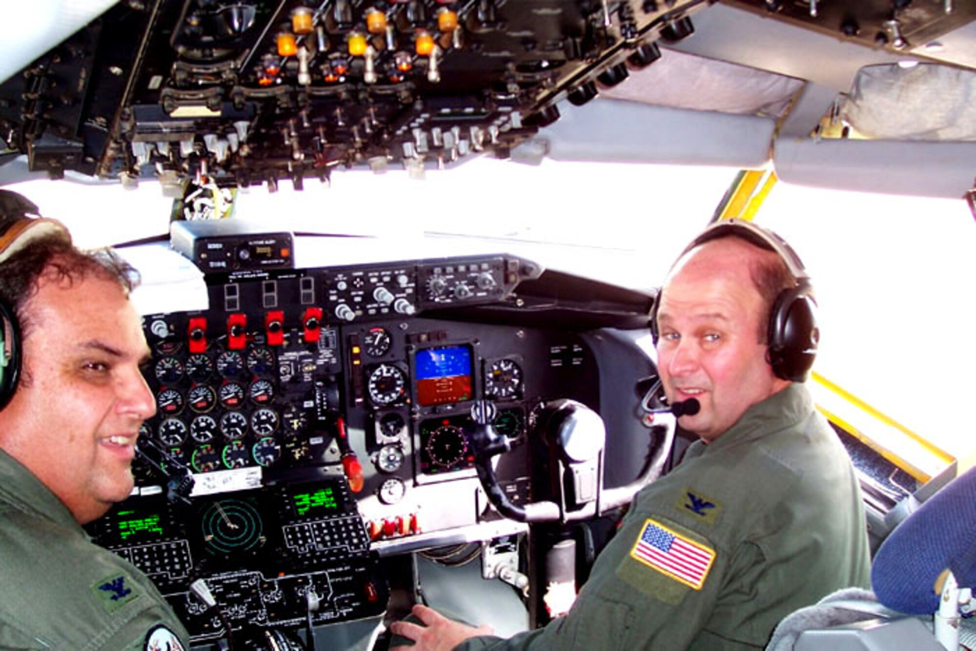 Col. James McCormack and Col. Jeffery Glass prepare for takeoff during their first duo commander mission July 26 at Tinker Air Force Base, Okla. Colonel McCormack is the 137th Airlift Wing commander, and Colonel Glass is the 507th Air Refueling Wing commander. Colonel McCormack's Air National Guard wing is slated to stand up as a KC-135 Stratotanker associate wing affiliated with Colonel Glass's Air Force Reserve Command wing in late 2007. The merger is the first time an Air National Guard wing has associated to an Air Force Reserve wing. (U.S. Air Force photo) 
