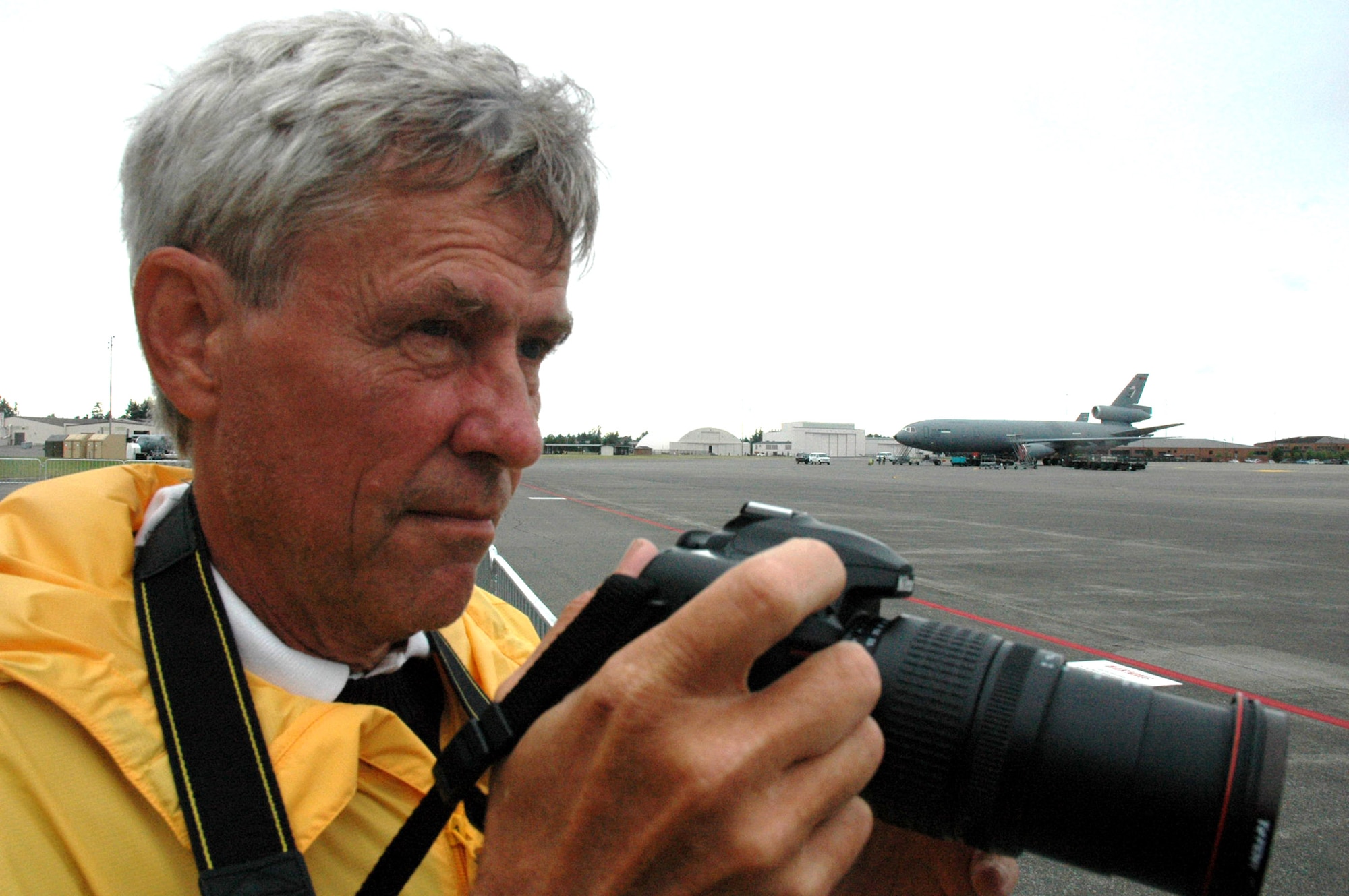 James Consor takes a photo of a KC-10 Extender from McGuire Air Force Base, N.J., during operations July 23 for Air Mobility Command's Rodeo 2007 at McChord AFB, Wash. Mr. Consor is an artist from New York City, and a member of the Air Force Art Program. He has been an artist for more than 39 years and works in oils. He is one of four artists in the Air Force Art Program to visit Rodeo 2007 for future art works for the Air Force. (U.S. Air Force photo/Tech. Sgt. Scott T. Sturkol) 
