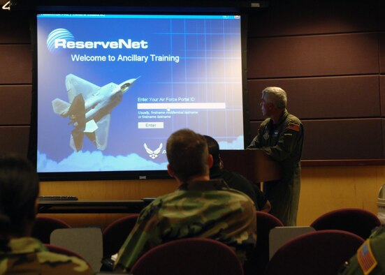 Members of the 931st Air Refueling Group are briefed on ReserveNet in the 18th Air Refueling Squadron conference room. (Air Force Photo/TSgt Jason Schaap)