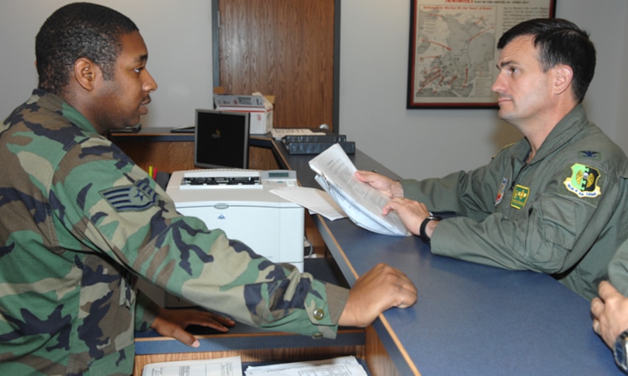 MINOT AIR FORCE BASE N.D. -- Colonel Parker Northrup, 5th Operations Group Commander,  reviews "go, no go" procedures with Staff Sgt. Devin Russell, 5th Operations Support Squadron, during a tour of the 23rd Bomb Squadron here July 26. Colonel Northrup assumed command of the 5th OG July 10th. (U.S. Air Force photo by Senior Airman Christopher Boitz)