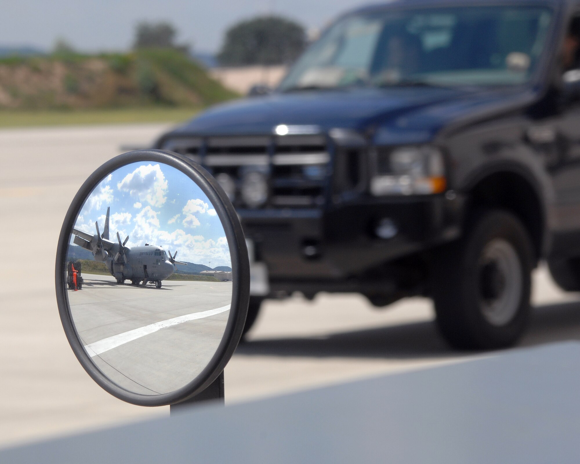 A Ramstein vehicle is on the move on the flightline July 25. Ramstein's flightline is one of the busiest in U.S. Air Forces in Europe, with personnel working around the clock. It is the only category 3 flightline in the Department of Defense and is home to an array of aircraft.  (U.S. Air Force Photo/A1C Kenny Holston)