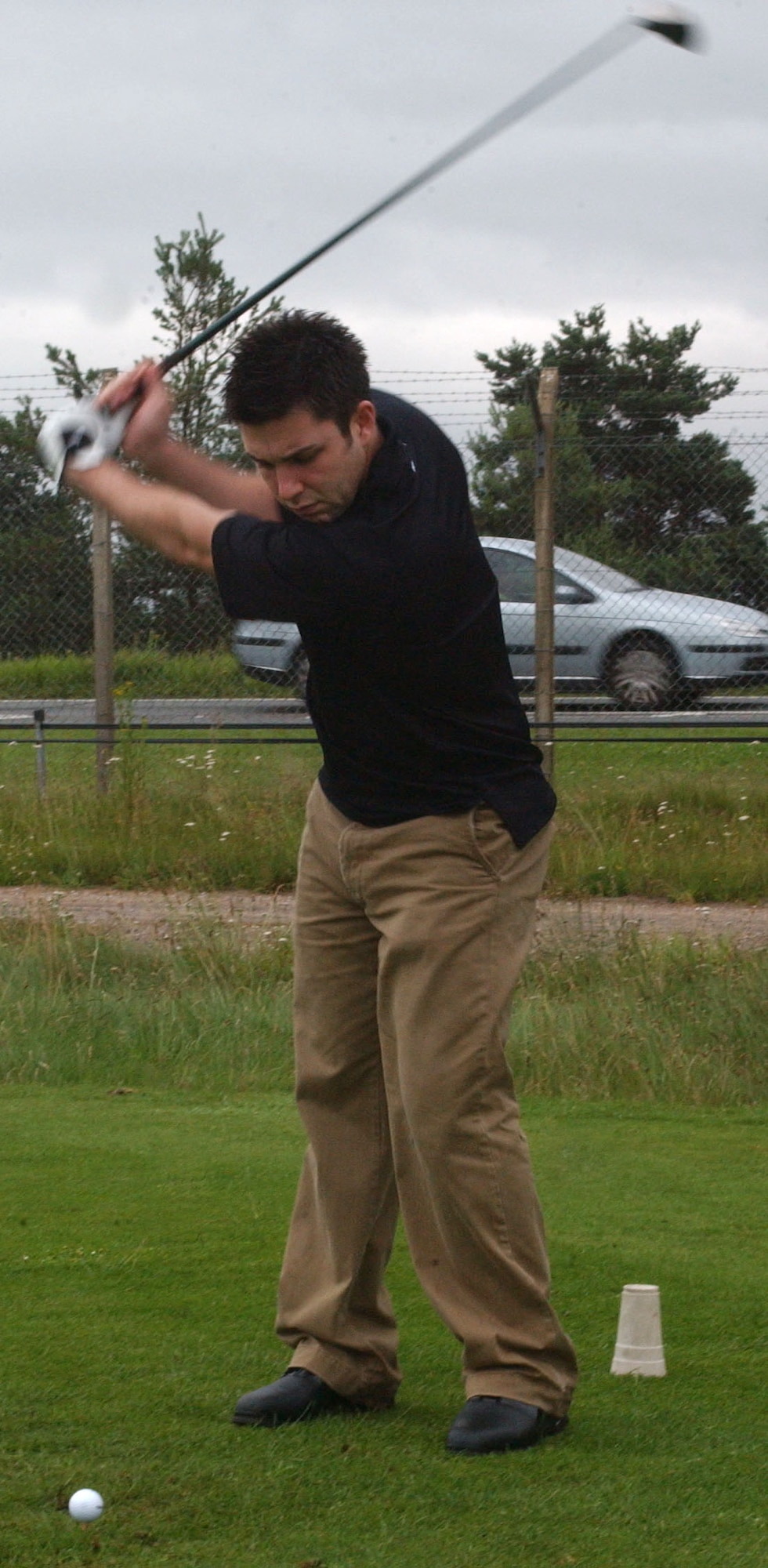Senior Airman Mark LeCouter, 352nd Operations Support Squadron, drives the ball off the tee box during the RAF Mildenhall Airman Commited to Excelence tournament July 13th at Breckland Pines Golf Course held at RAF Lakenheath.(U.S Air Force photo by Brad Smith)
