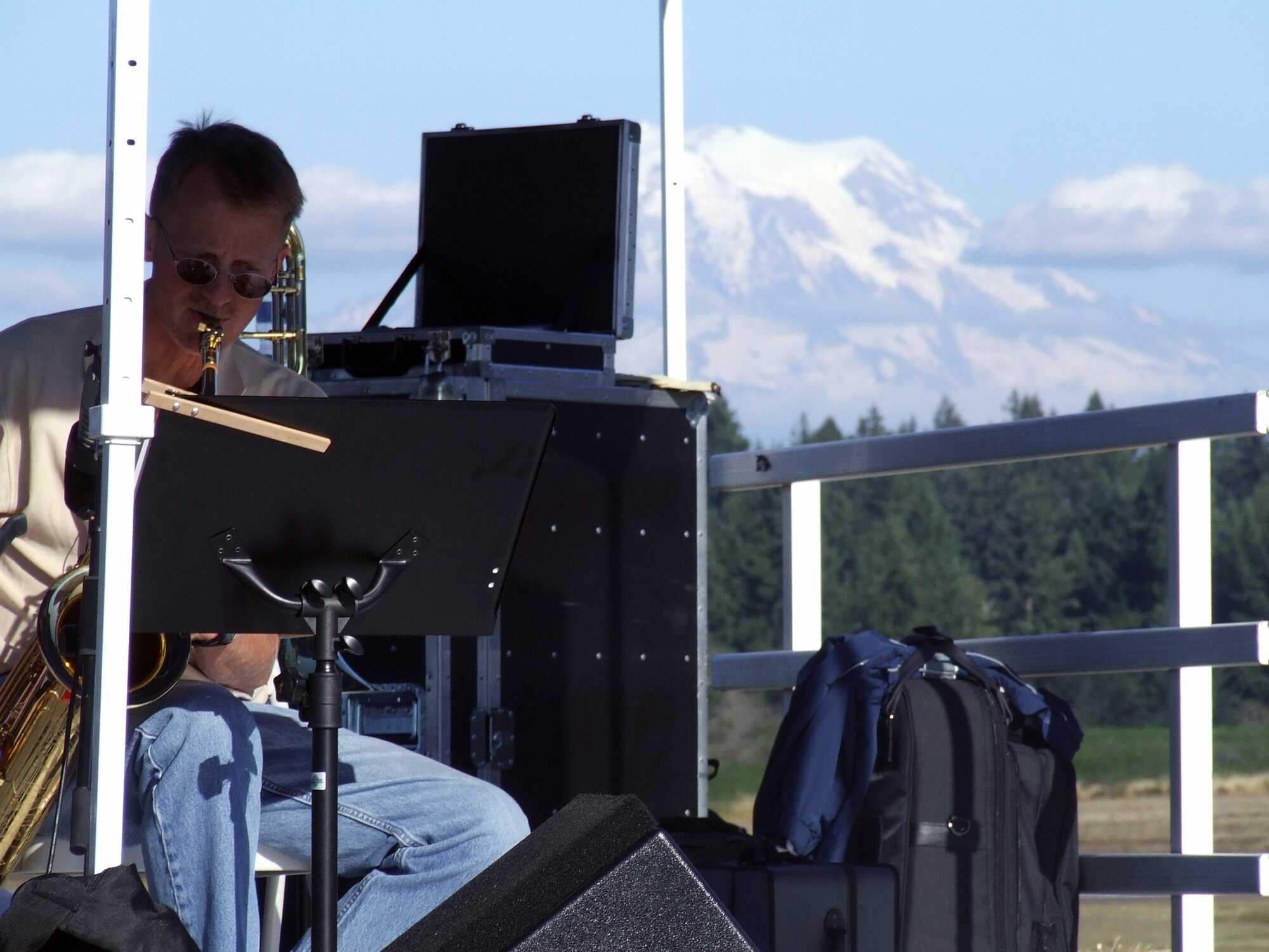 Senior Master Sgt. Mark Hanson, Air Mobility Command Band of the Golden West, Travis Air Force Base, Calif., plays during a show at "Rainier Ranch" for Air Mobility Rodeo 2007 at McChord AFB, Wash., July 24.  Rodeo, sponsored by Air Mobility Command, is a readiness competition between U.S. and international mobility air forces.  (U.S. Air Force Photo/Tech. Sgt. Scott T. Sturkol)
