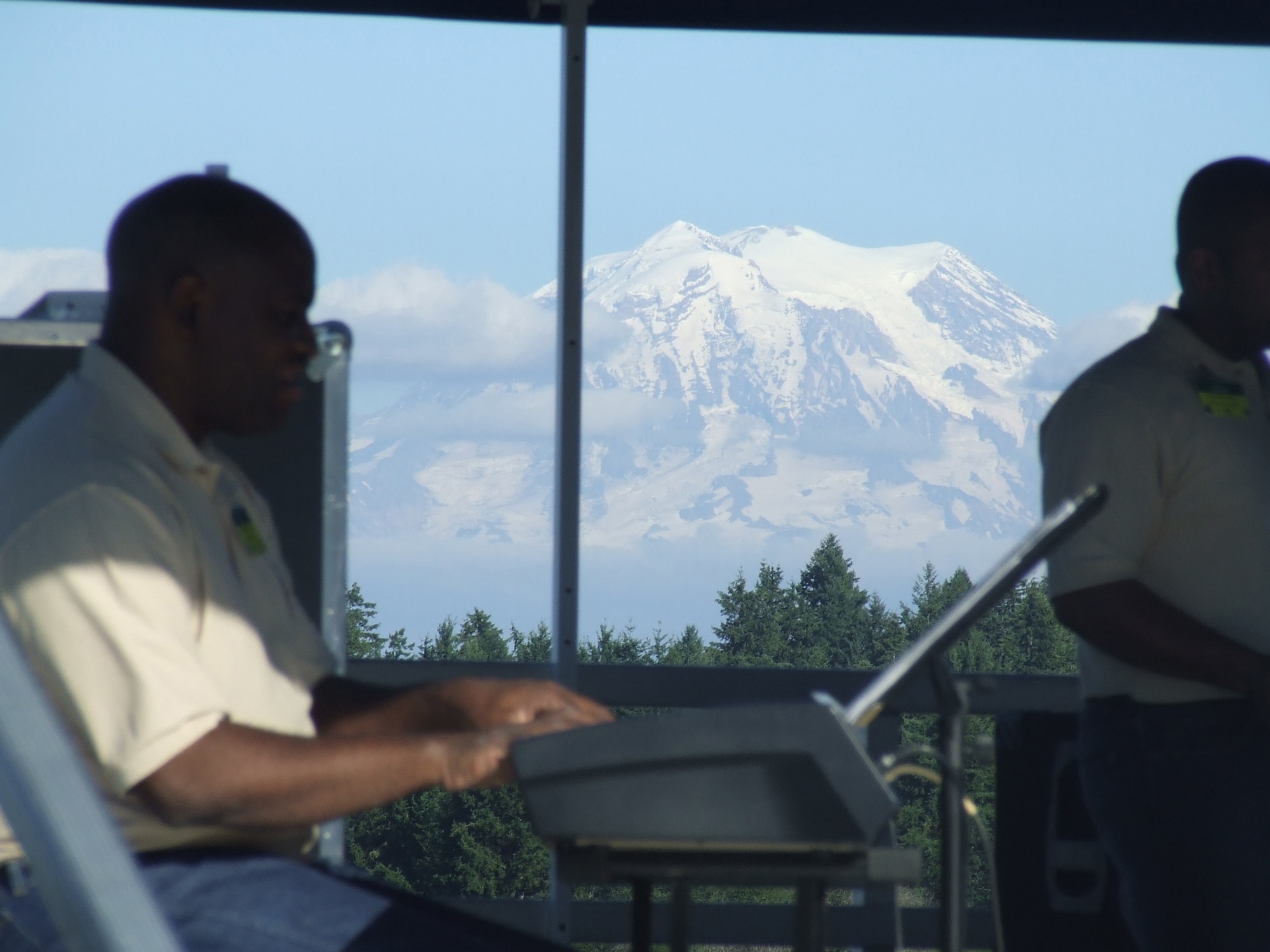 Tech. Sgt. Danny Hall, Air Mobility Command Band of the Golden West, Travis Air Force Base, Calif., plays the keyboards during a show at "Rainier Ranch" for Air Mobility Rodeo 2007 at McChord AFB, Wash., July 24.  Rodeo, sponsored by Air Mobility Command, is a readiness competition between U.S. and international mobility air forces.  (U.S. Air Force Photo/Tech. Sgt. Scott T. Sturkol)