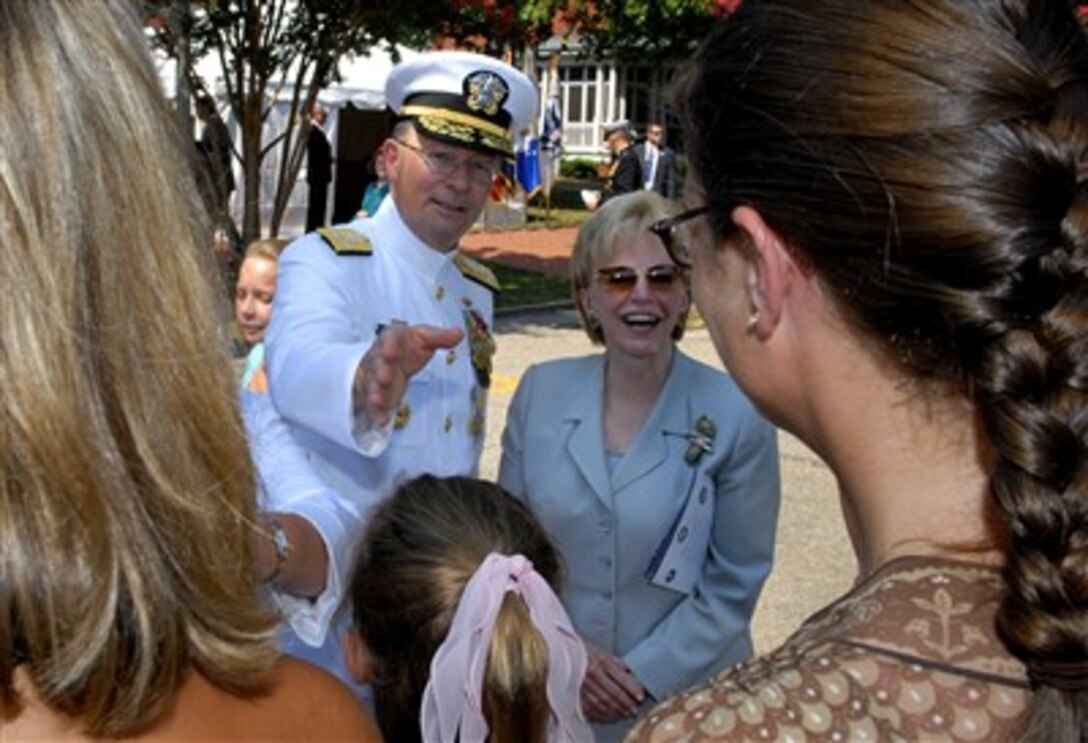 Vice Chairman of the Joint Chiefs of Staff U.S. Navy Adm. Edmund Giambastiani introduces Mrs. Lynn Cheney to his family after his retirement ceremony in Annapolis, Md., July 27, 2007. 