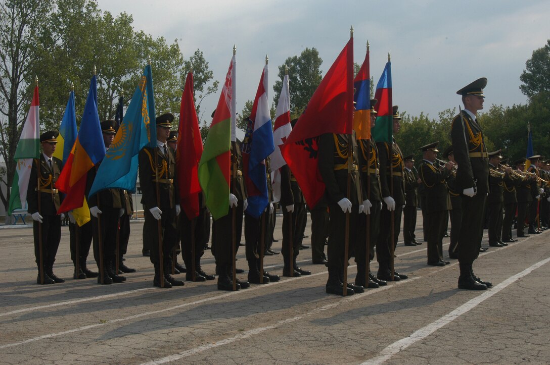 Members of the Republic of Moldova Honor Guard await for the opening ceremony of MEDCUER 2007 to begin at Bolboaca Training Center, Moldova, July 30. MEDCUER 2007 is a multinational medical training exercise, with 13 nations participating.