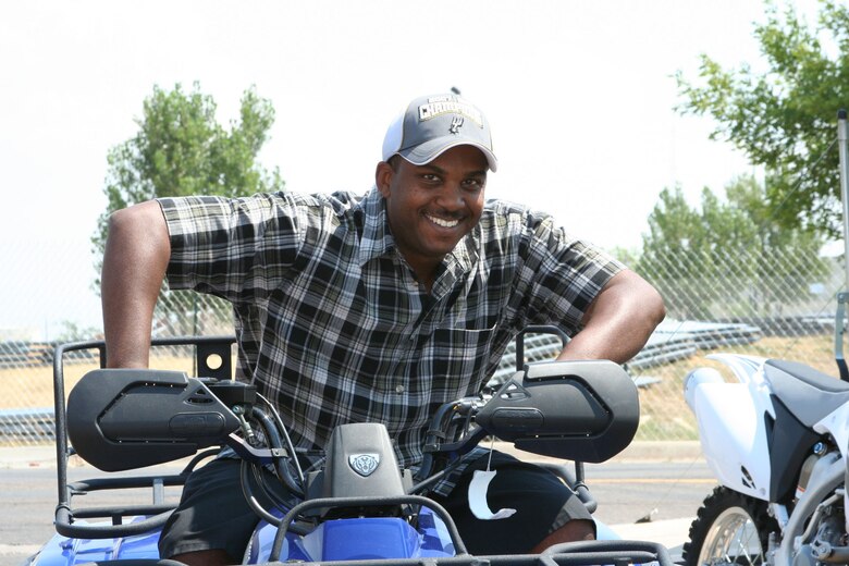 Tech. Sgt. Robert Pierce, 341st Medical Operations Squadron dental technician, won a four-wheeler at the "Cruisin' the Summer" base picnic July 27. His name was drawn from more than 700 contest entrants. More than 2,500 people attended the free, annual barbeque at Malmstrom Air Force Base, Mont., sponsored by the 341st Services Squadron and several local businesses. (U.S. Air Force photo/Senior Airman Eydie Sakura).