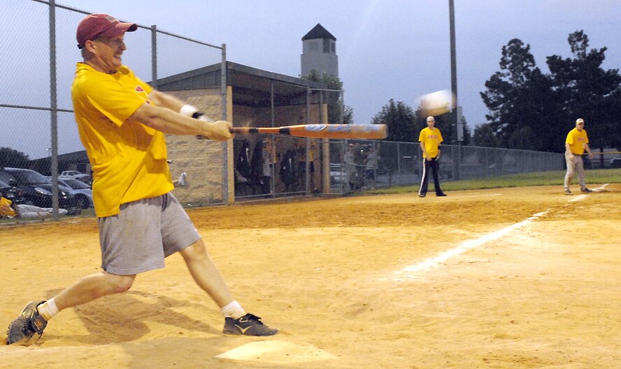 Tech. Sgt. Todd Brooks, 723rd Aircraft Maintenance Squadron, smashes a pitch during Moody's Intramural Softball Championship July 26. The 723rd AMXS beat out the 23rd Mission Support Group in the final game to win Moody's highest softball honor. (U.S. Air Force photo by Staff Sgt. Manuel Martinez)